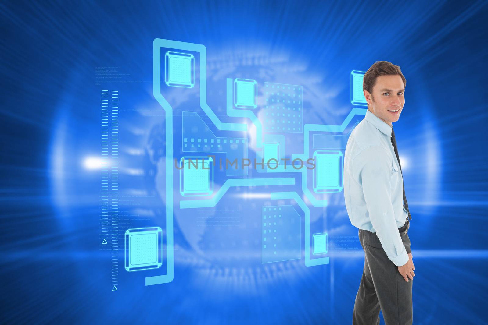 Happy businessman standing with hand in pocket against global technology background