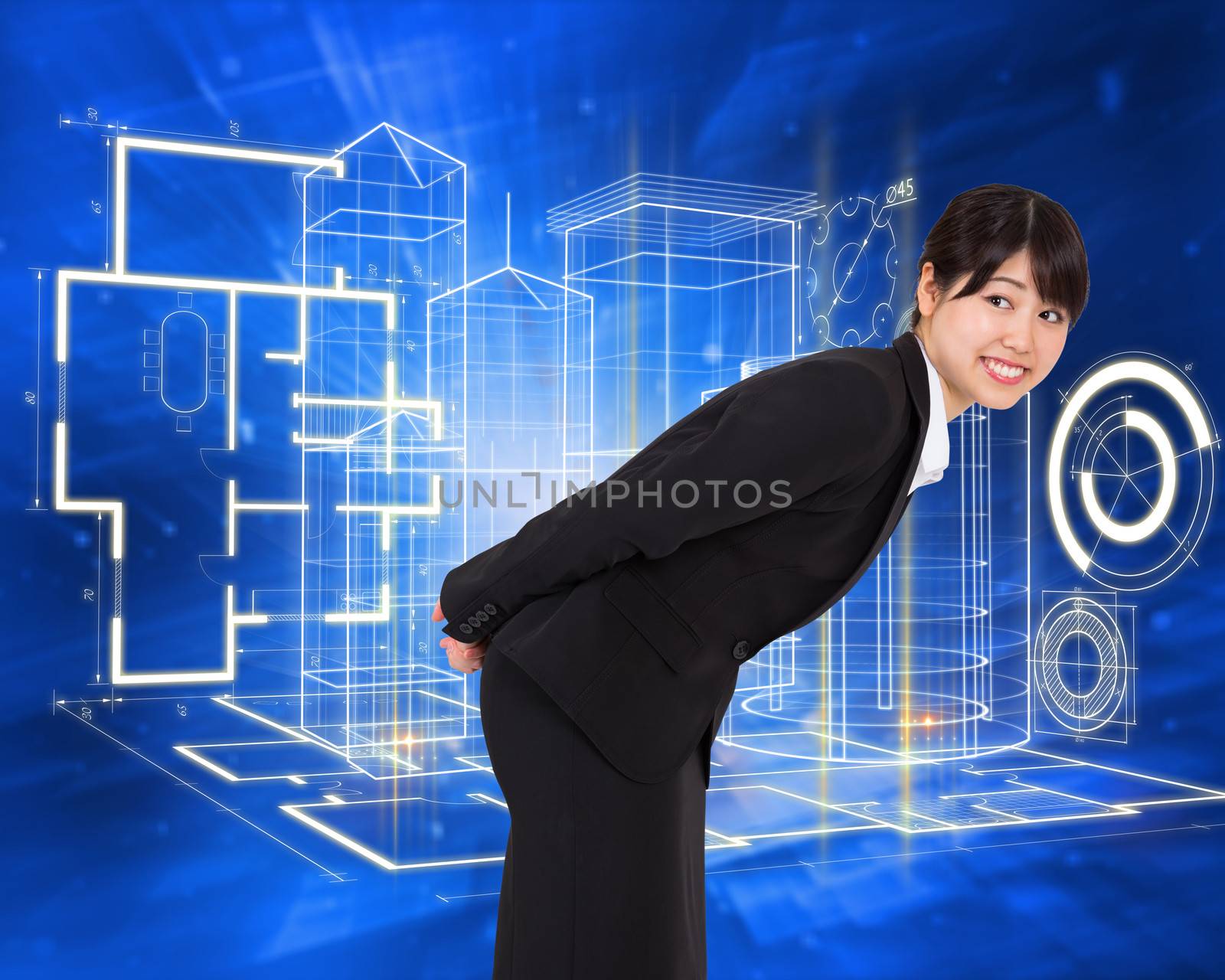 Smiling businesswoman bending against abstract blue squares