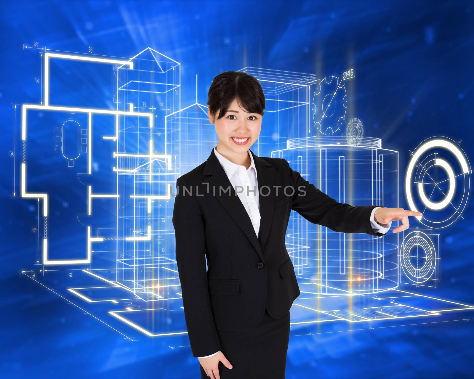 Smiling businesswoman pointing against abstract blue squares
