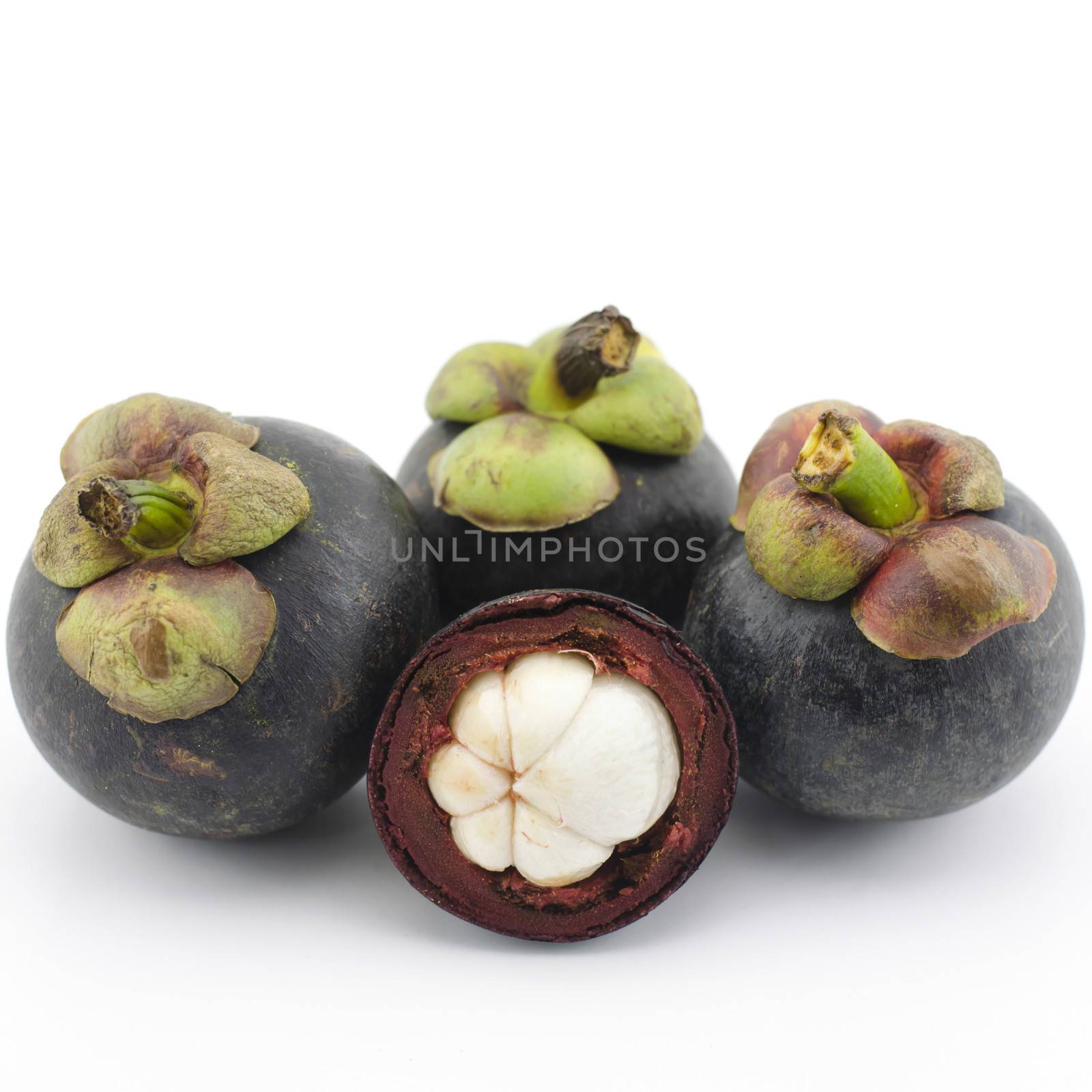 mangosteen isolated on white by ammza12