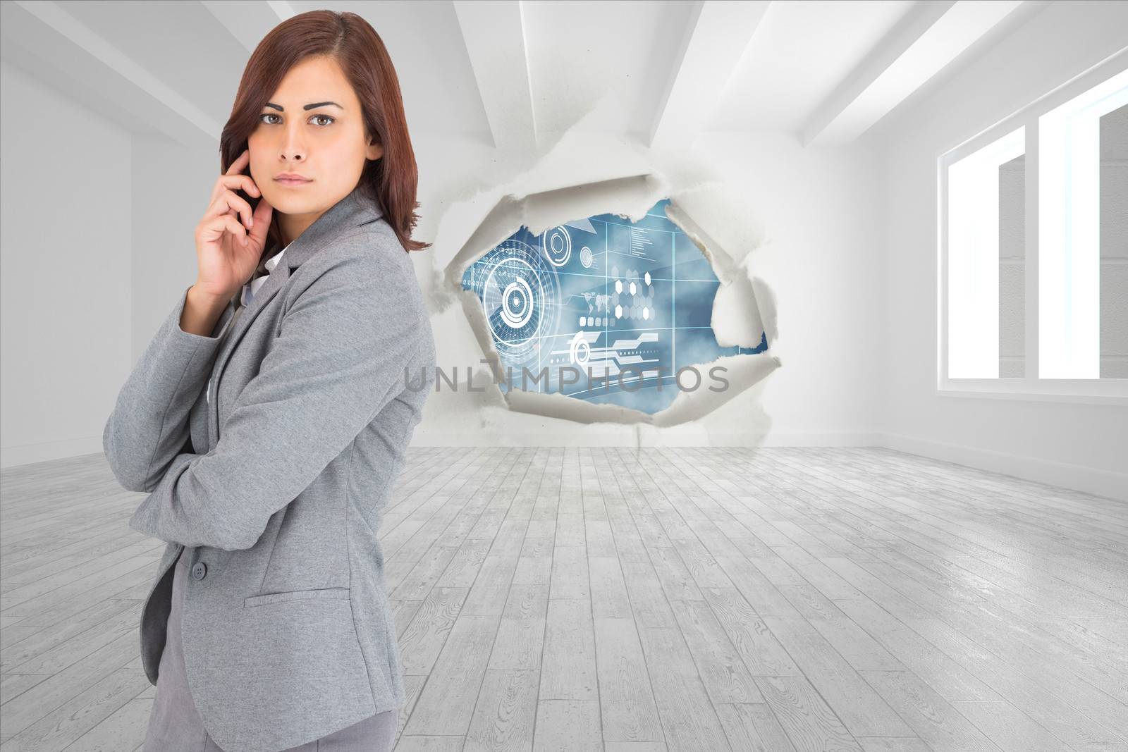Composite image of concentrating businesswoman by Wavebreakmedia