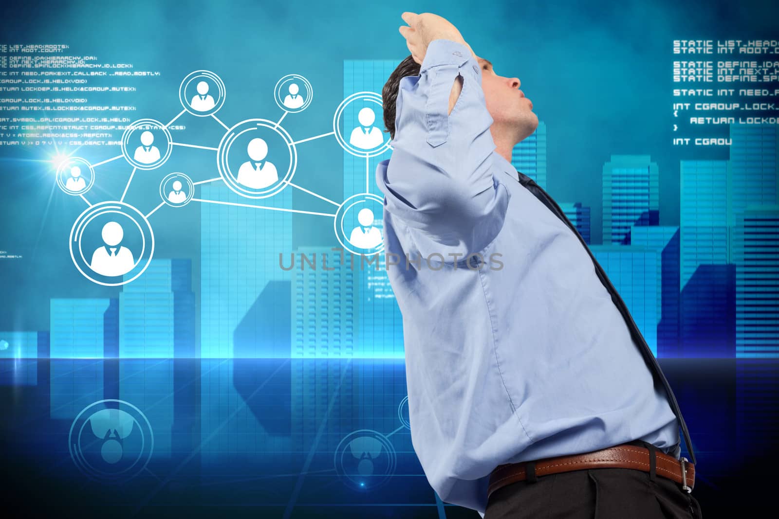 Businessman posing with arms raised against futuristic technology interface