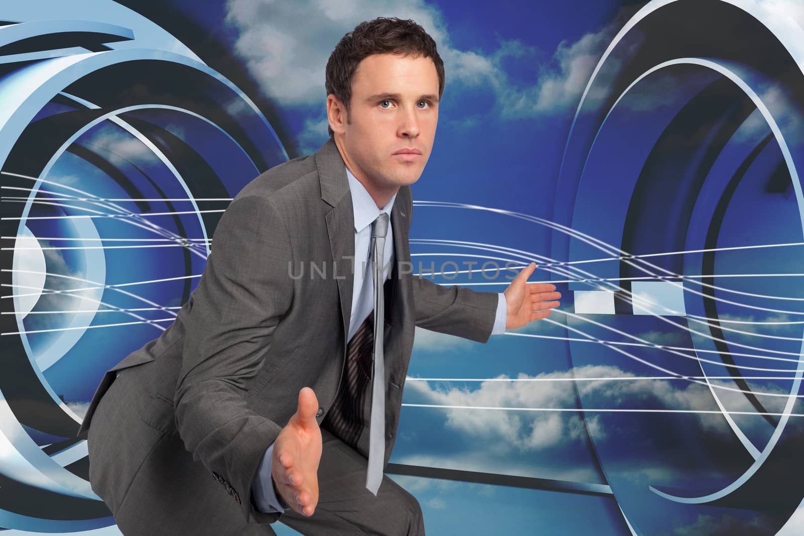Businessman posing with hands out against abstract white line design on blue sky