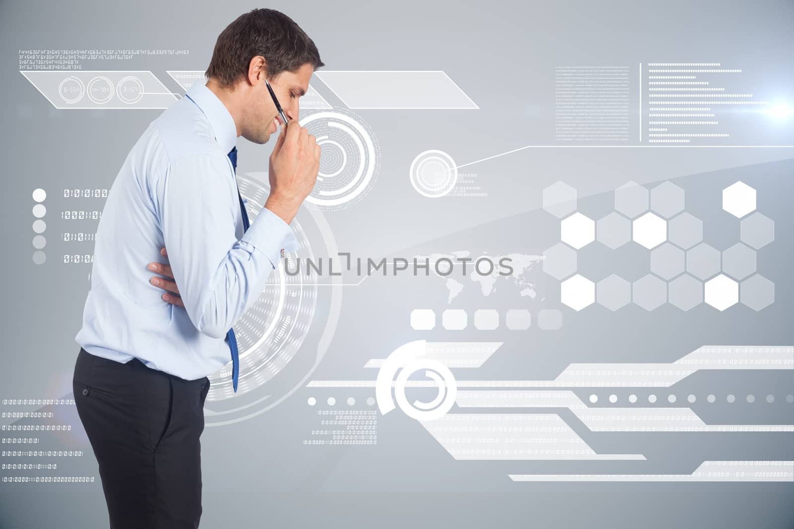 Thinking businessman holding pen against futuristic technology interface