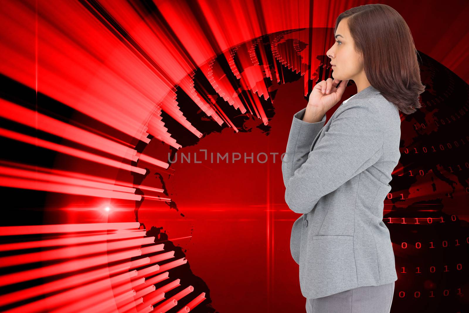 Composite image of concentrating businesswoman by Wavebreakmedia