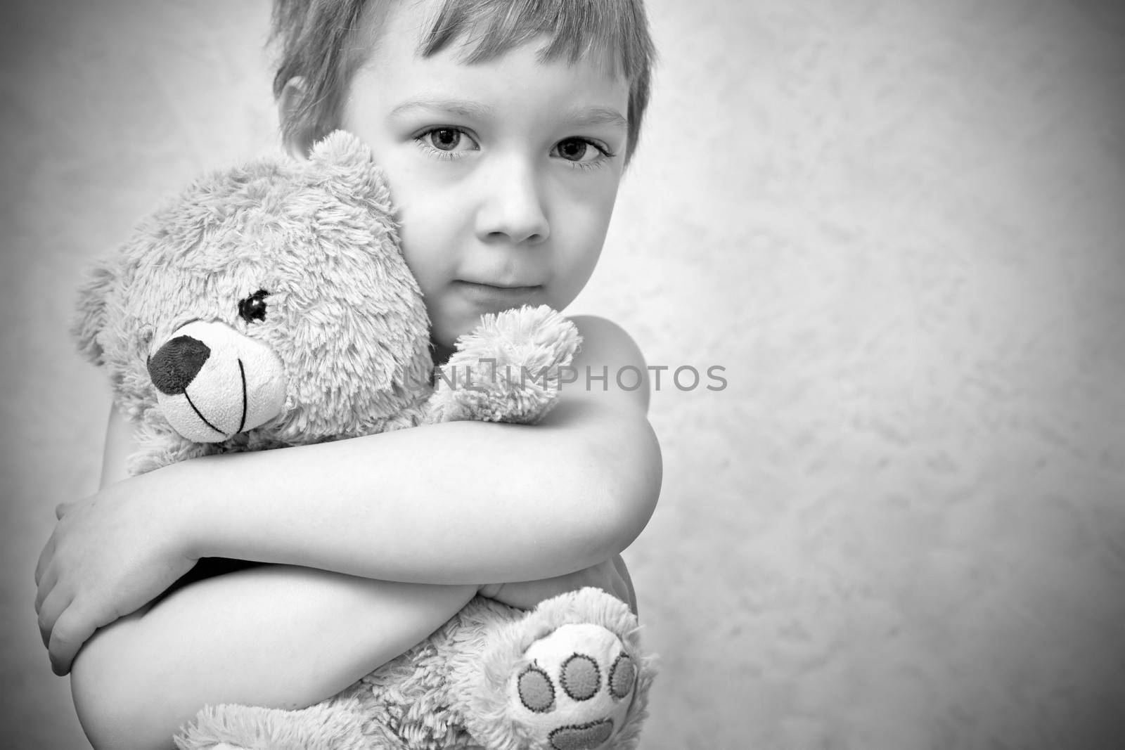 Young boy with teddy bear, portrait by anelina