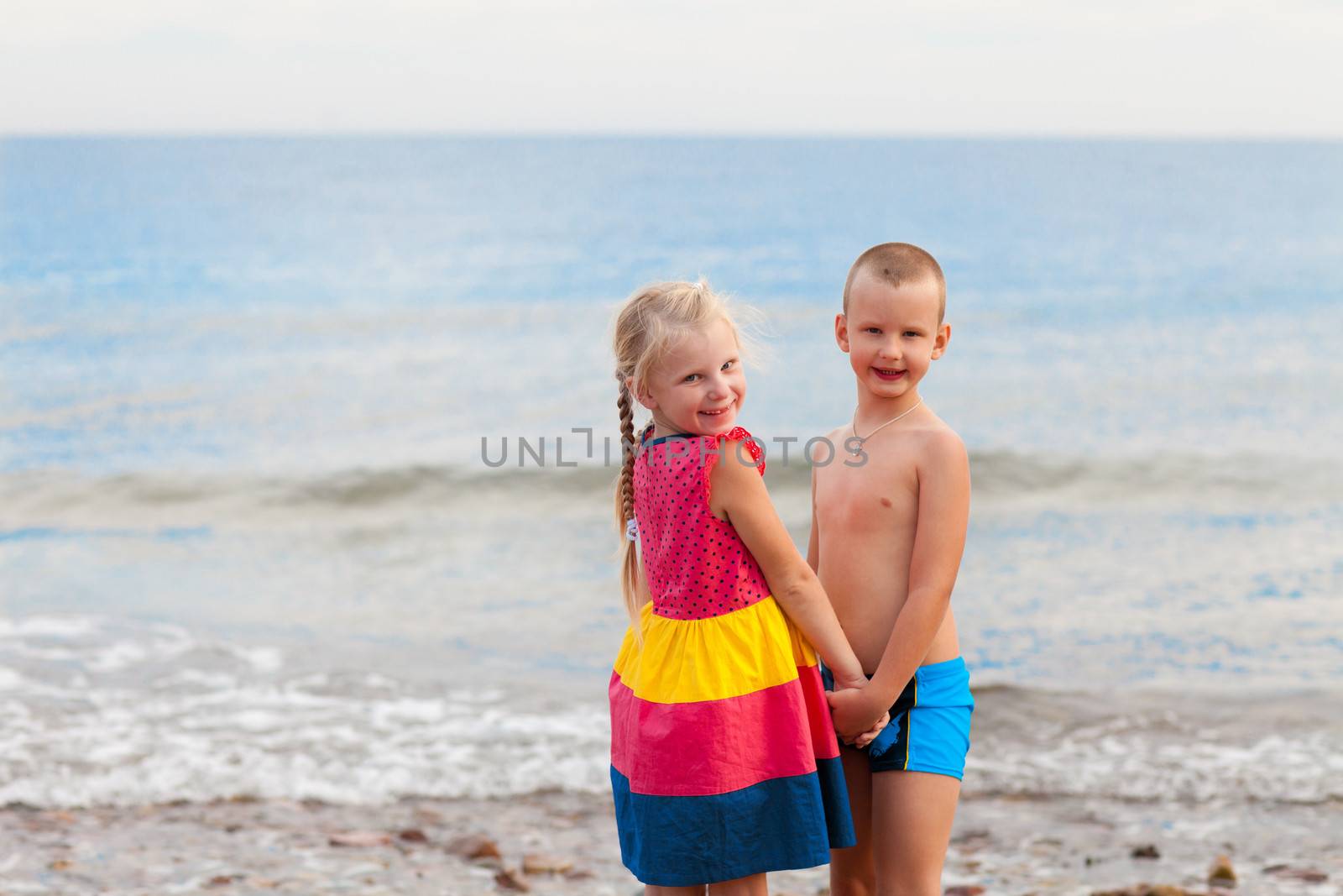 children on the beach by vsurkov