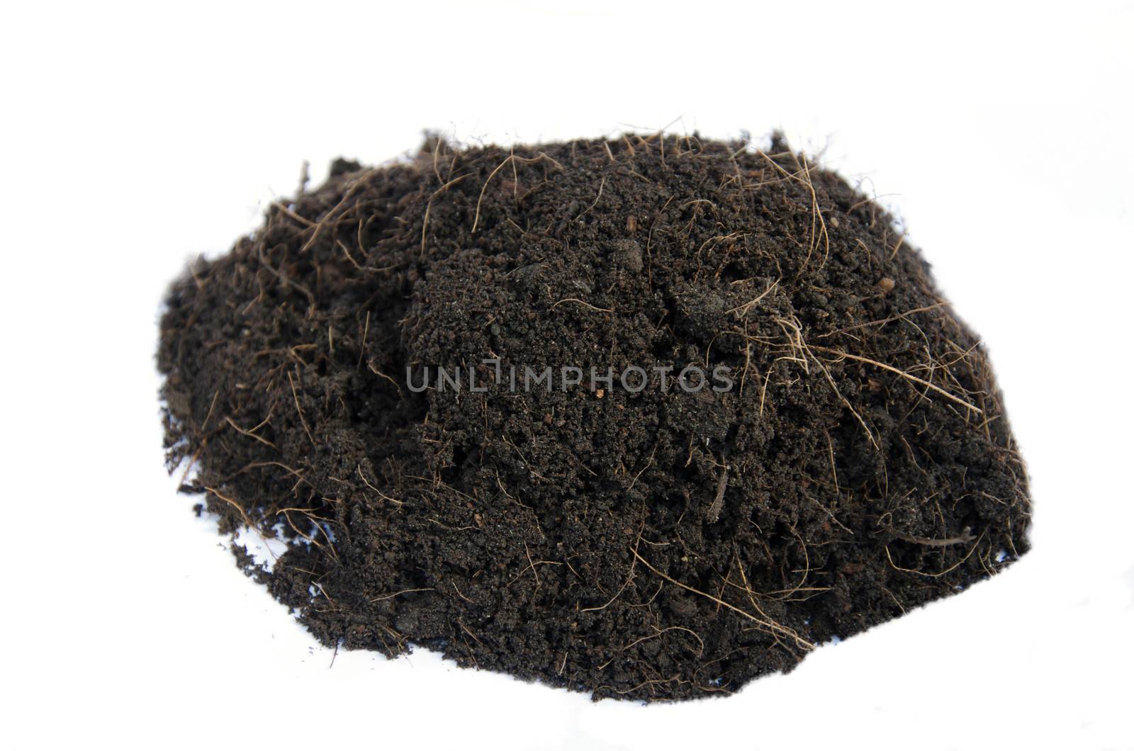 Mound of soil isolated with clipping path