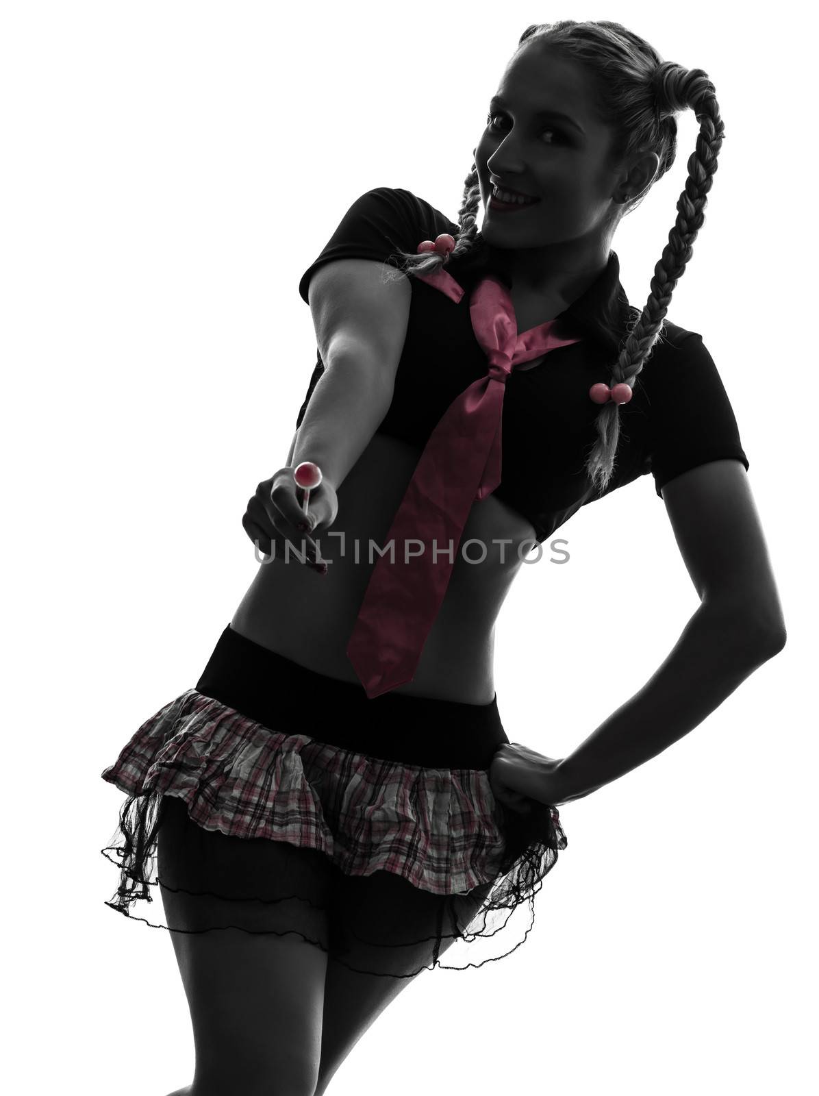 one caucasian sexy woman schoolgirl costume portrait in silhouette studio isolated on white background