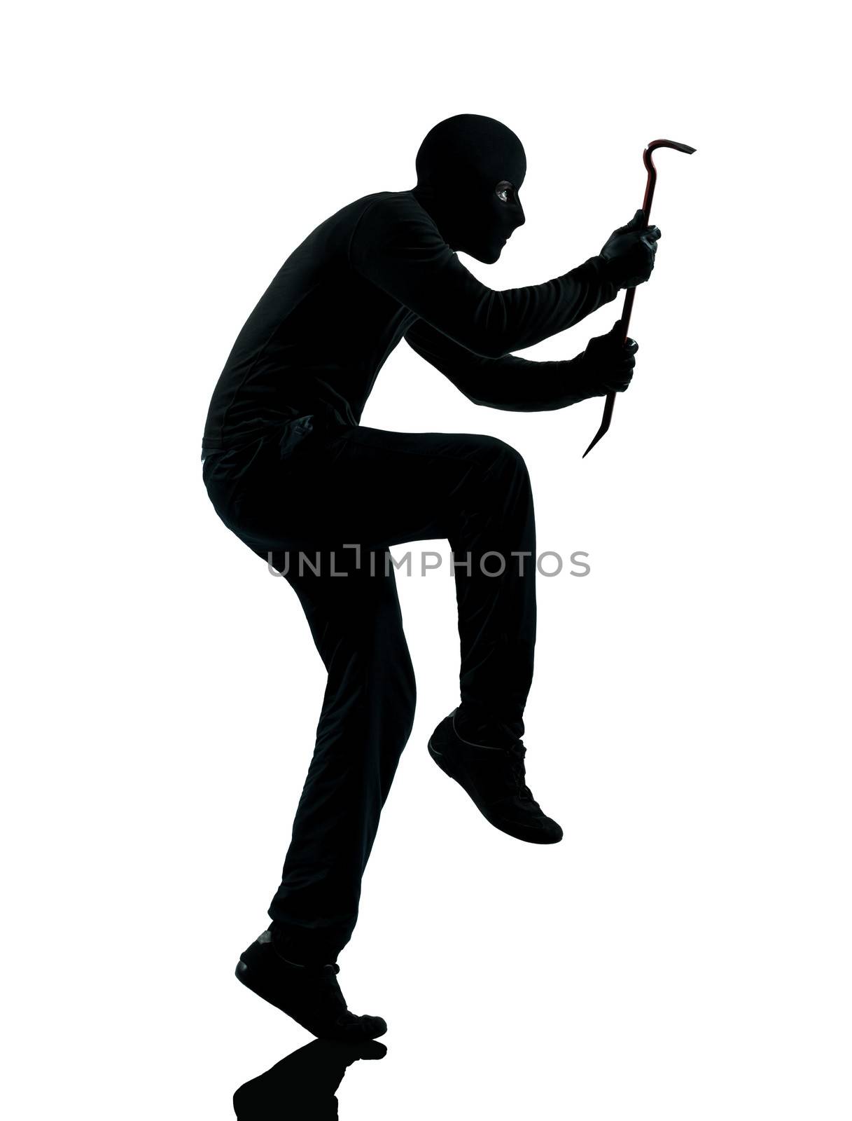 thief criminal walking quiet in silhouette studio isolated on white background