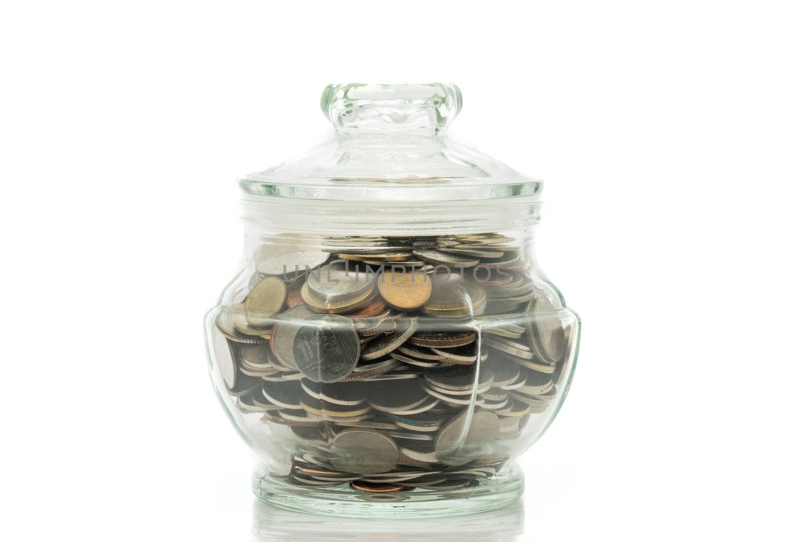 Bath coins in a glass jar with lid by Sorapop