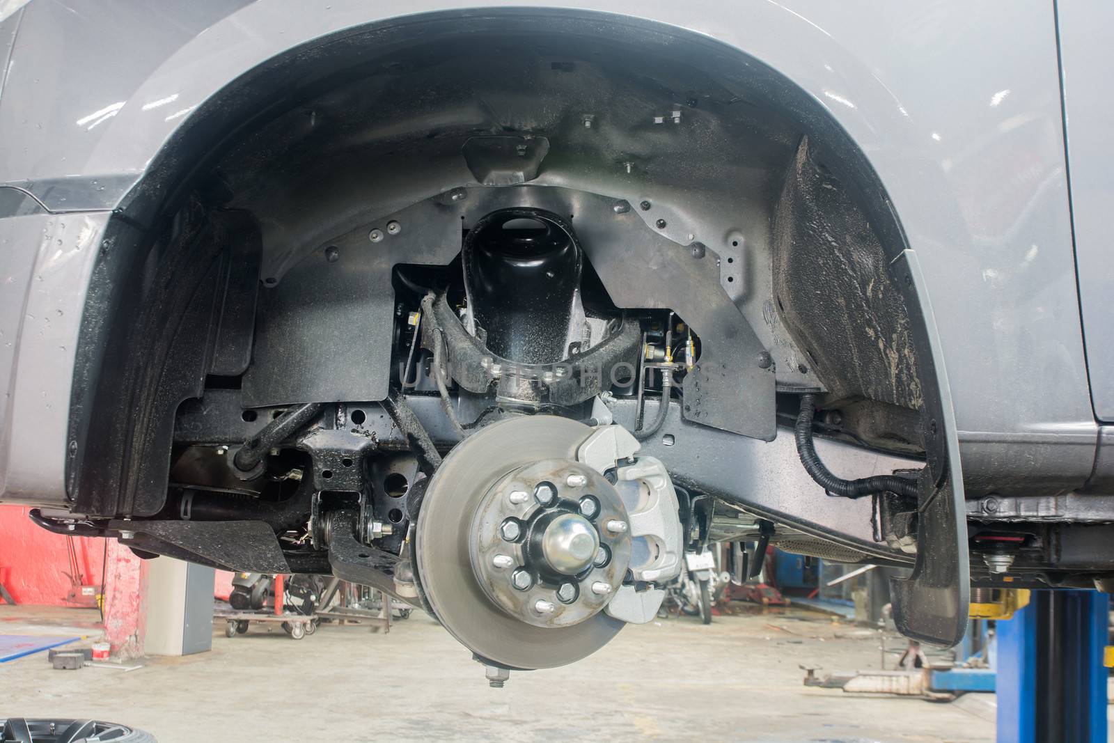 Front disk brake on car in process In the garage