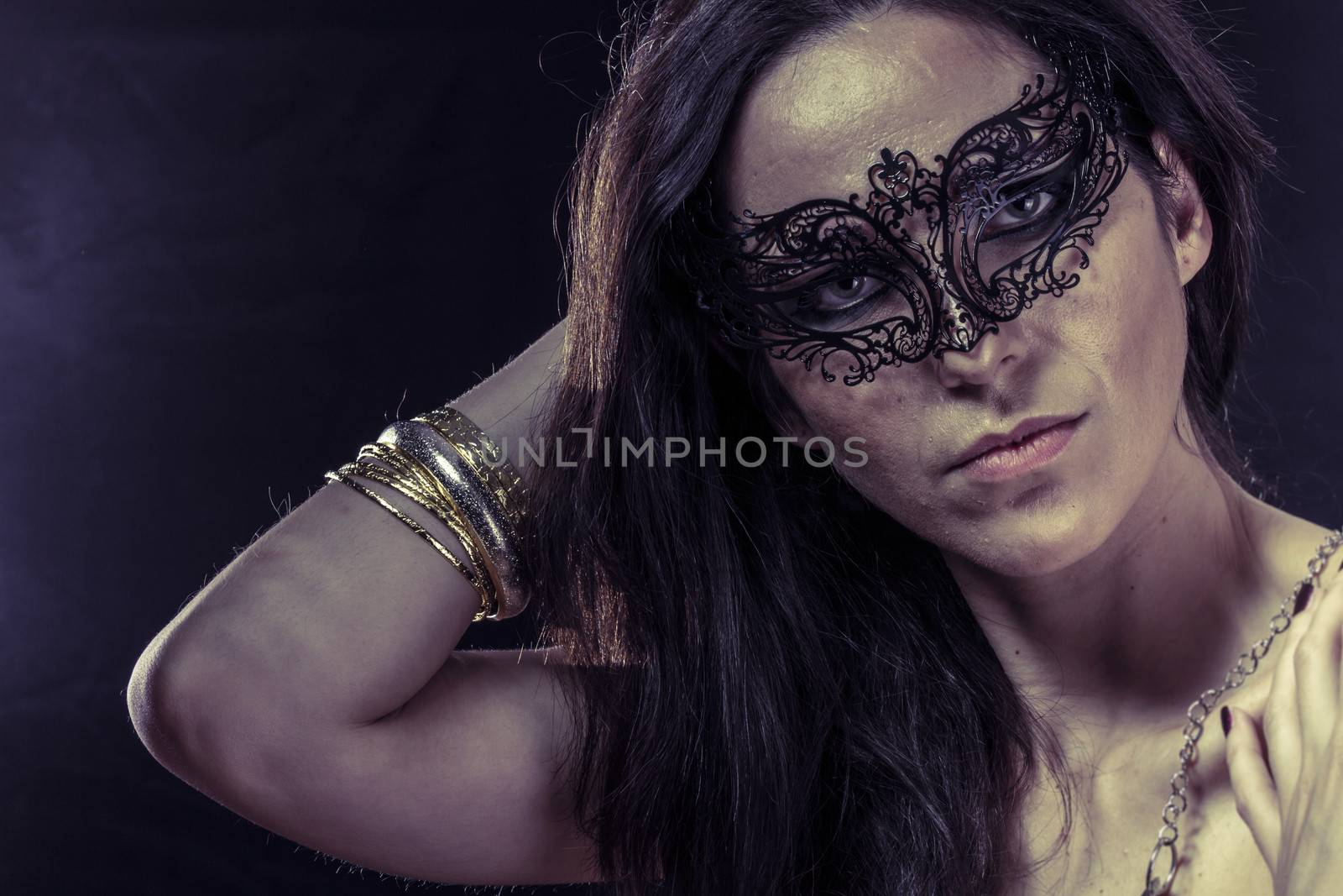 Lady.Beautiful young woman in mysterious black Venetian mask. Fa by FernandoCortes