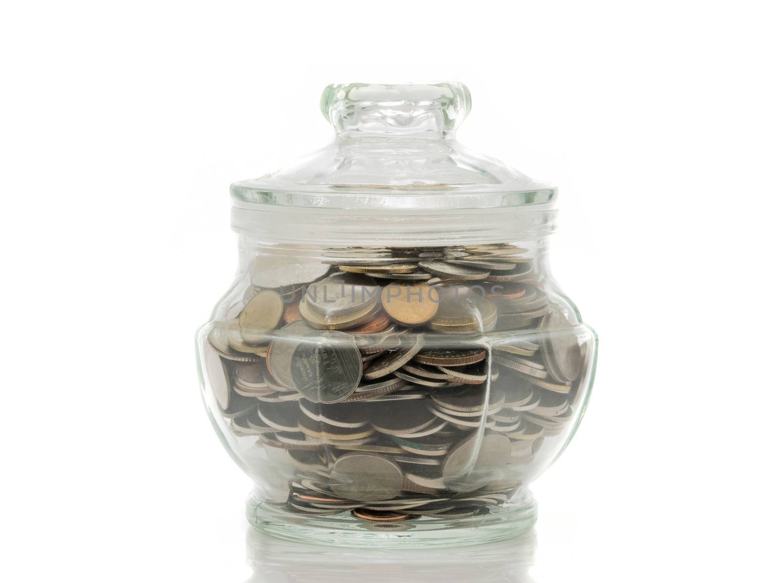 Bath coins in a glass jar with lid by Sorapop