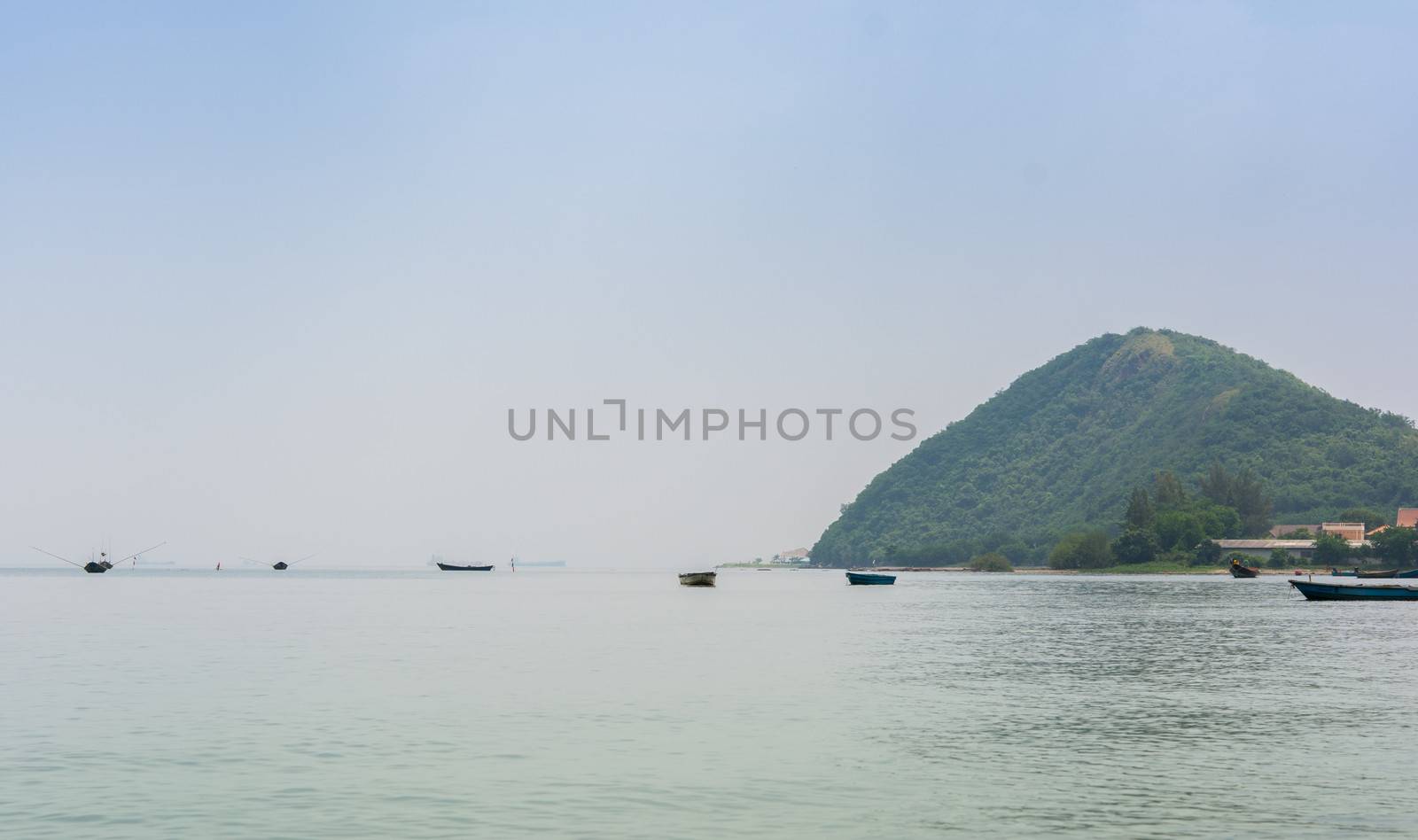 Fishing Boats and Mountain by Sorapop