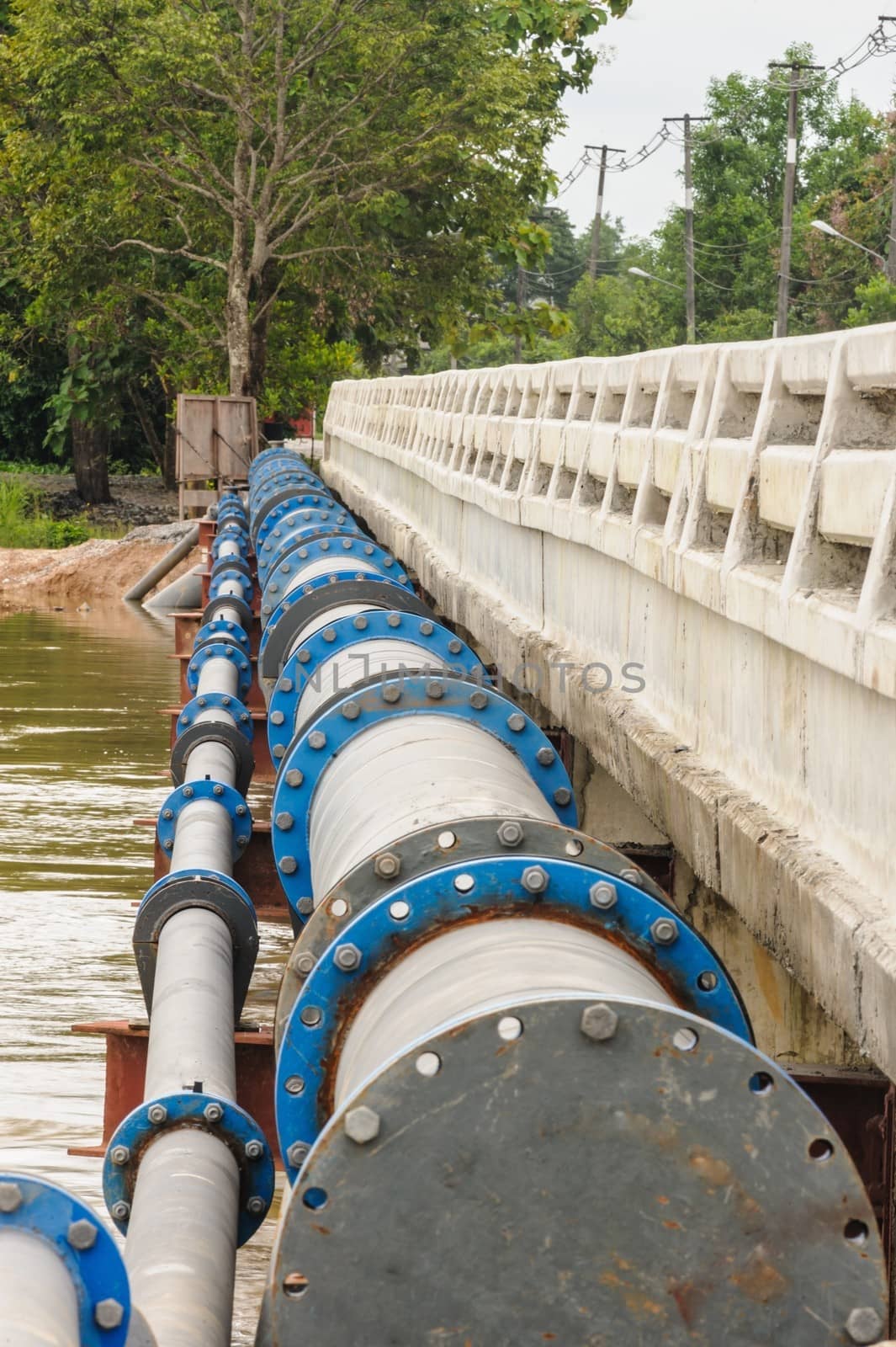 A big water supply main pipeline with irrigation.