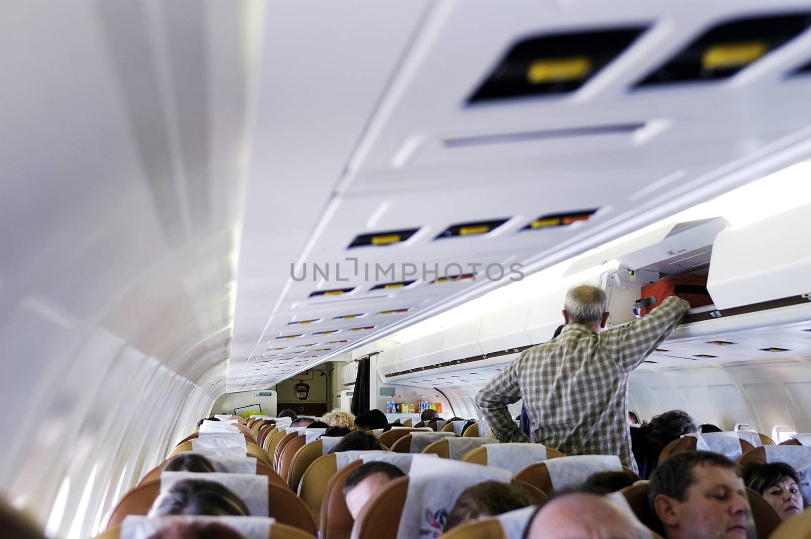 Within a commercial airliner of Air Burkina full-flight to the airport in Ouagadougou Burkina Faso