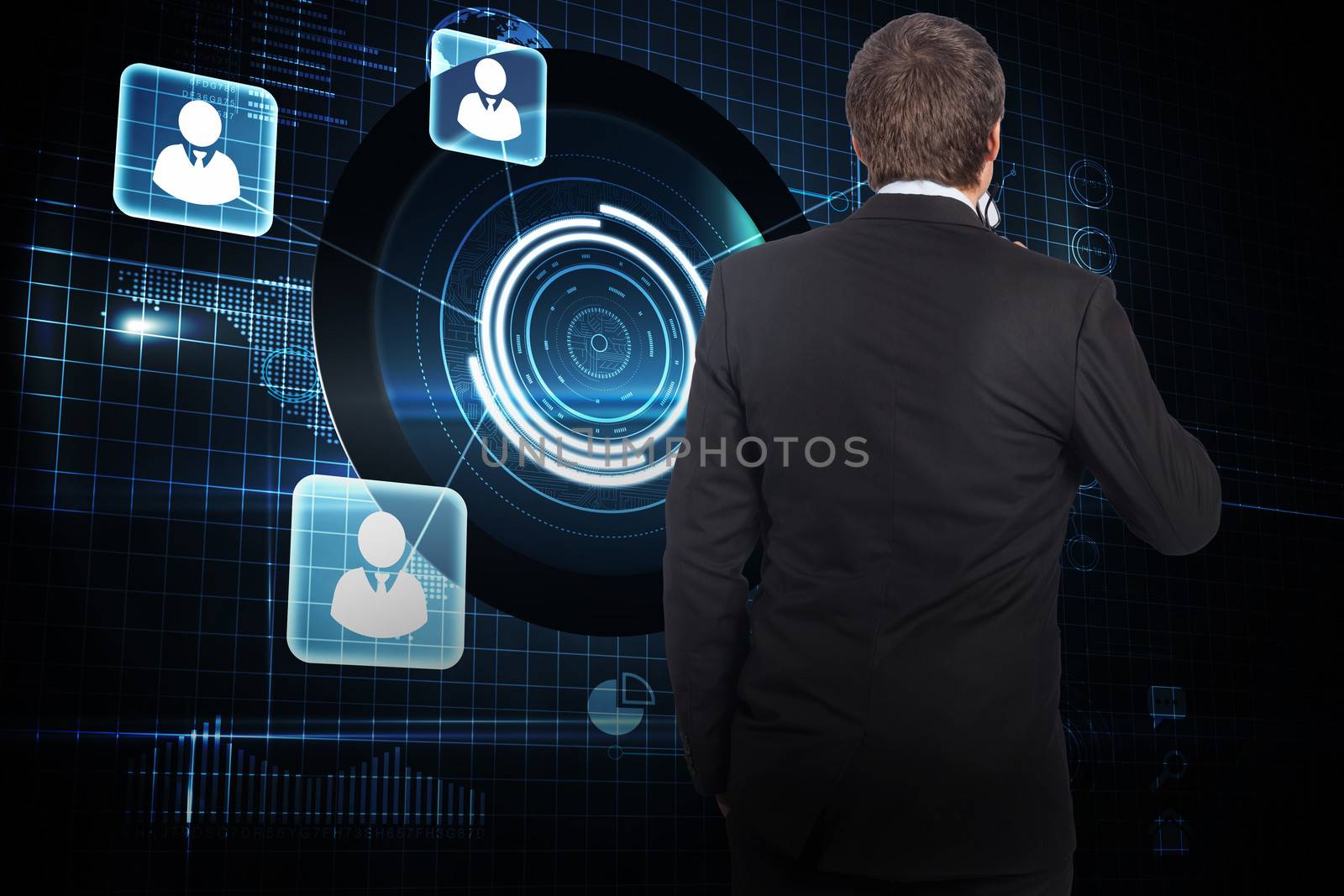 Thinking businessman holding glasses against futuristic technology interface