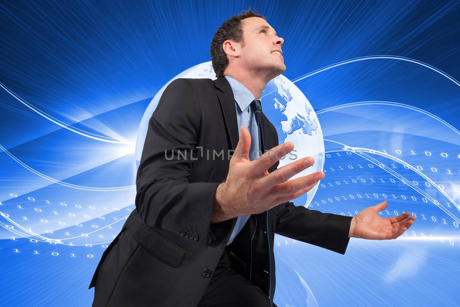 Businessman posing with arms out against global technology background