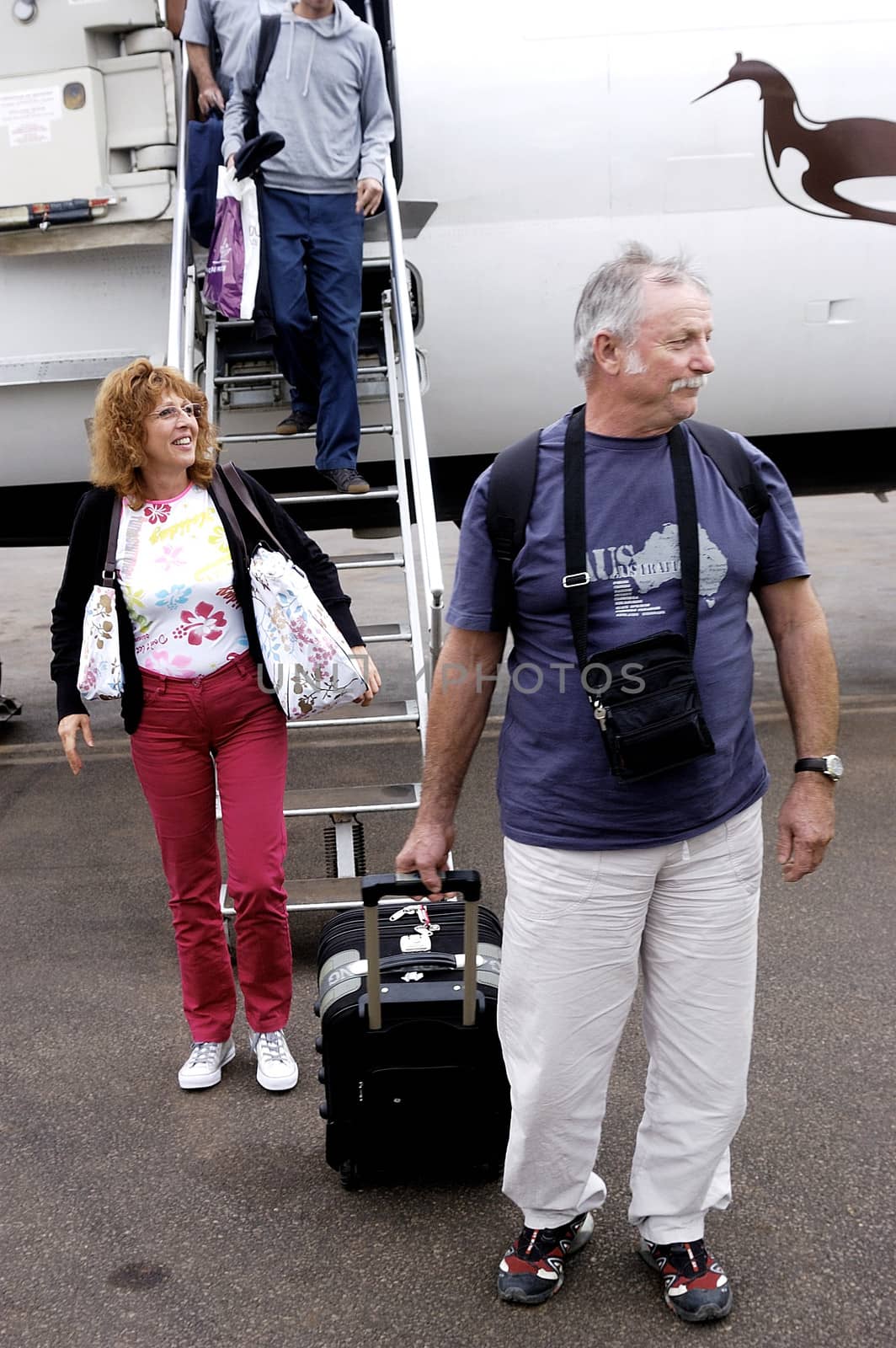 Disembarking passengers of an airliner company Air Burkina in Ouagadougou airport