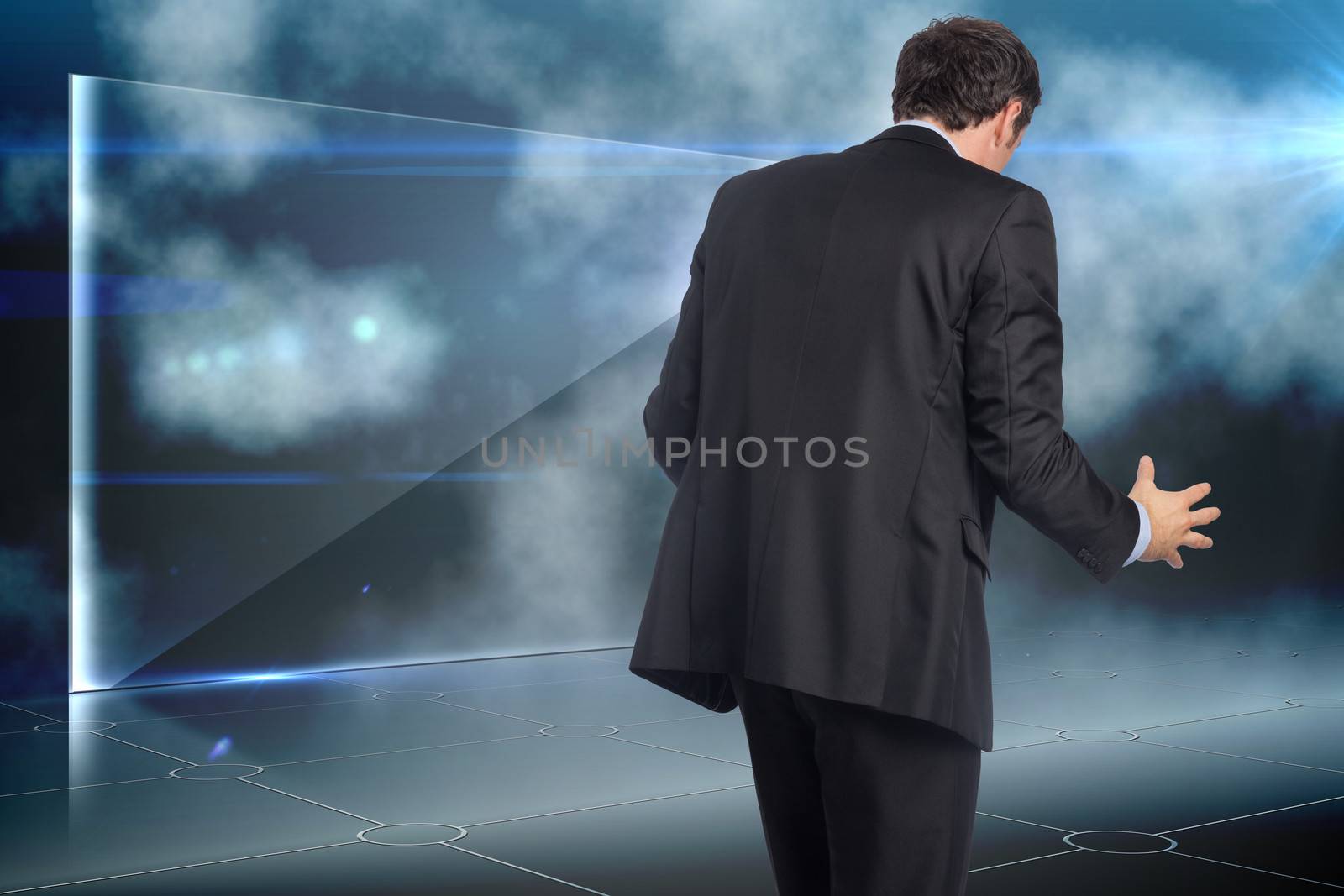 Stressed businessman gesturing against futuristic technology interface