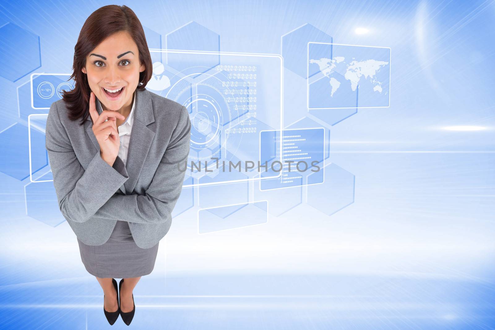 Composite image of smiling thoughtful businesswoman by Wavebreakmedia