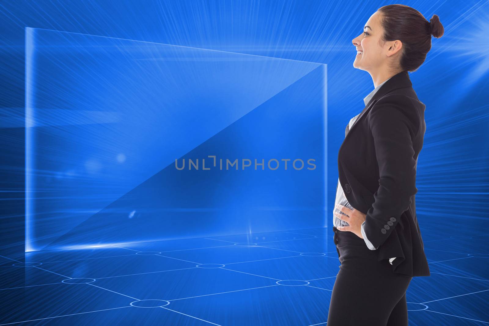 Happy businesswoman against futuristic technology interface