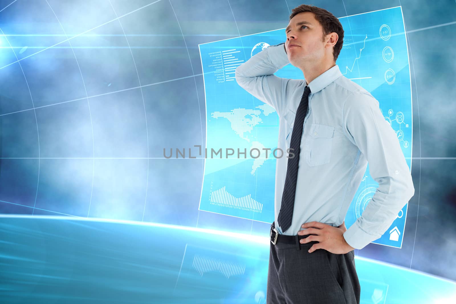 Thinking businessman with hand on head against futuristic technology interface