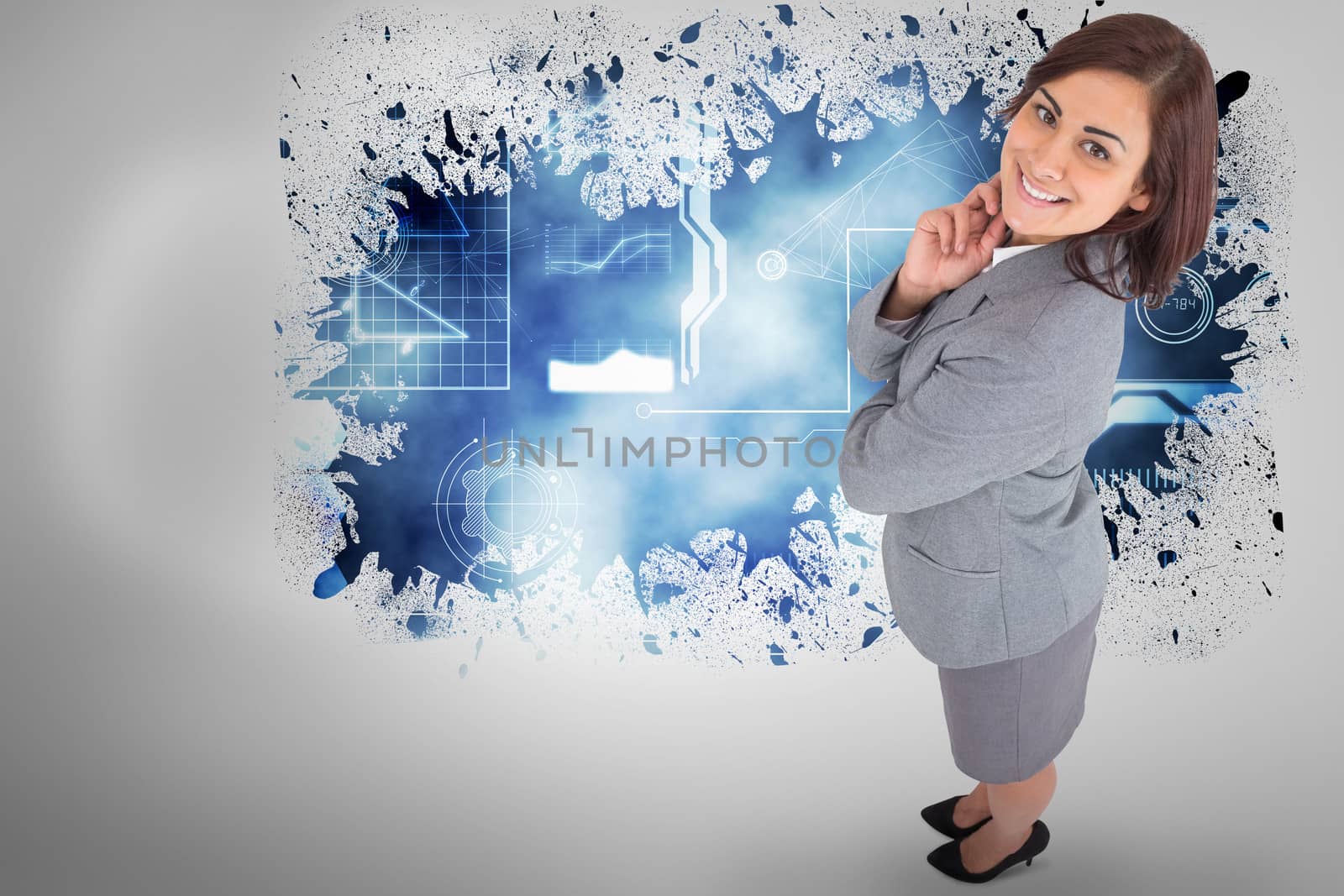 Composite image of smiling thoughtful businesswoman by Wavebreakmedia