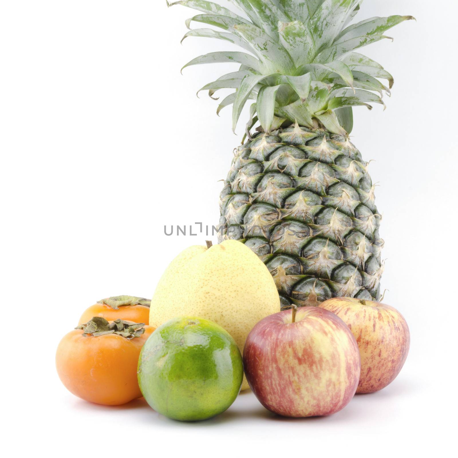 pineapple chinese pear persimon and green orange isolated on whi by ammza12