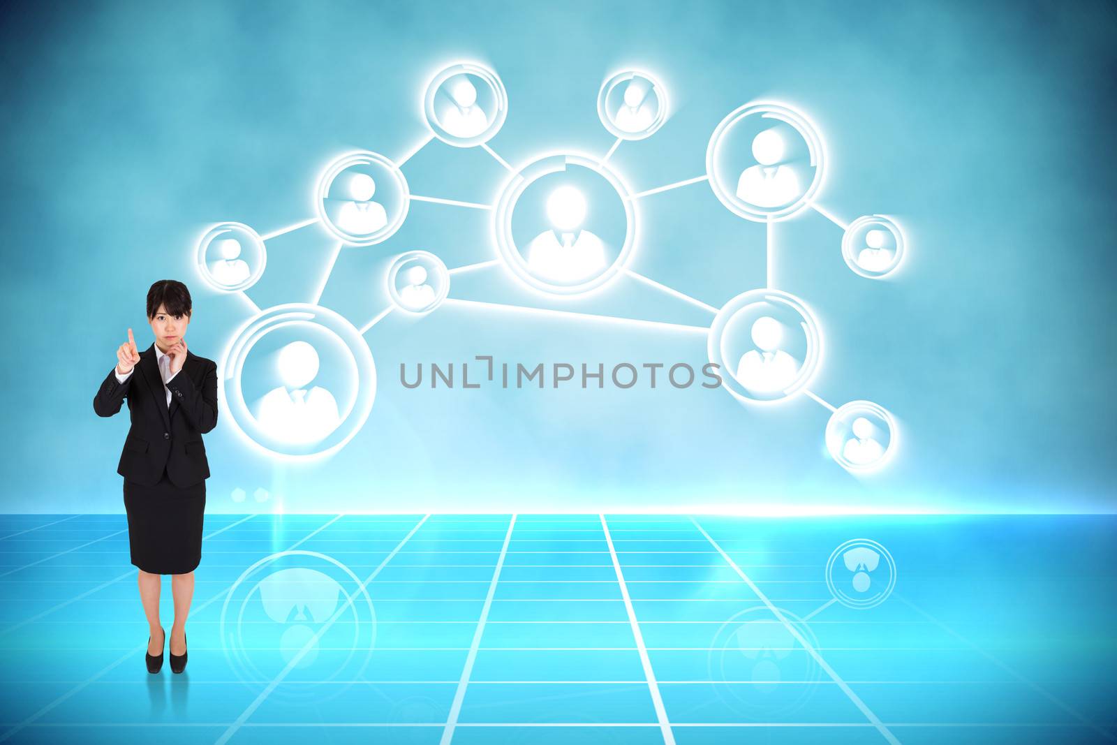 Composite image of thoughtful businesswoman pointing by Wavebreakmedia