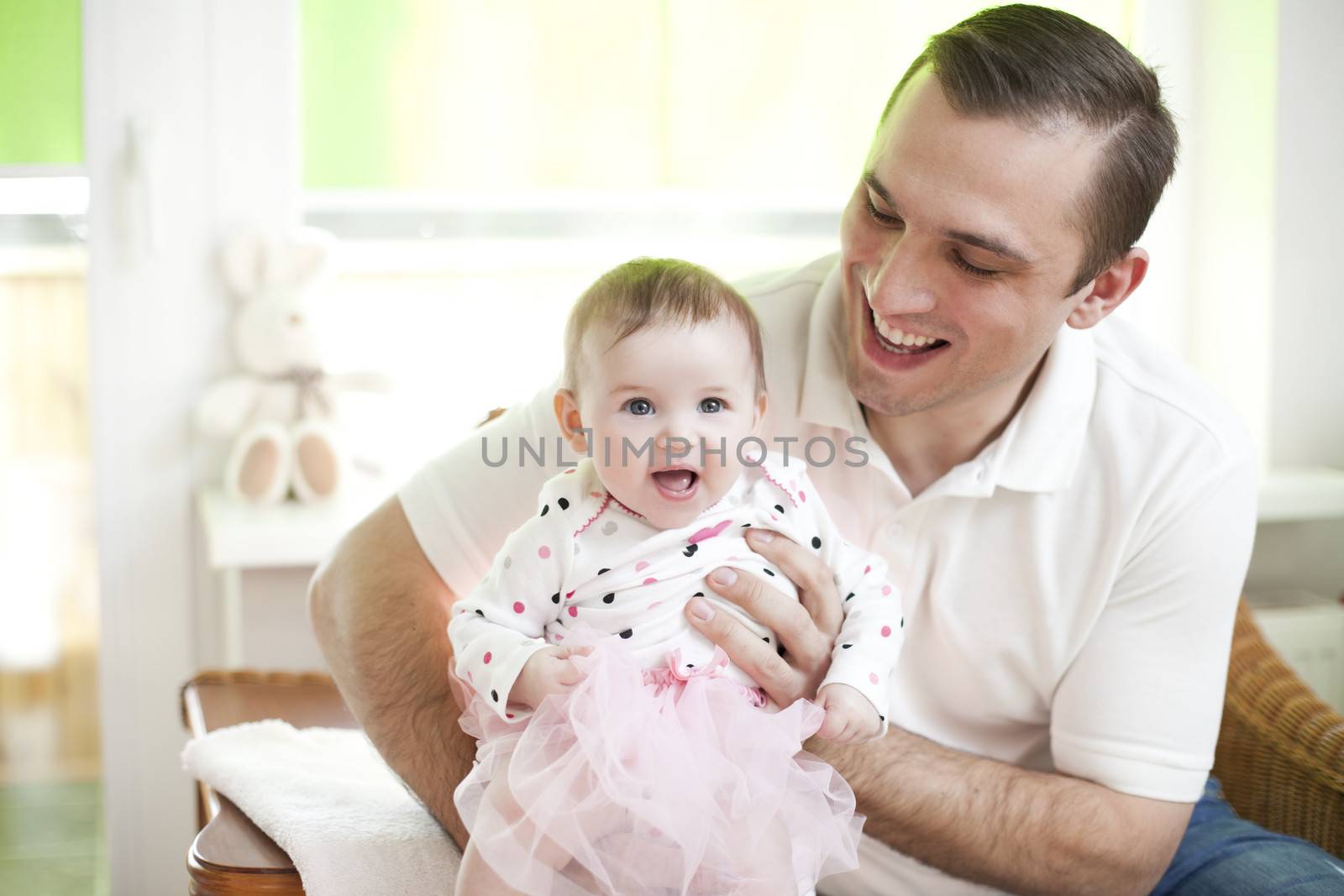 Father and his baby dauther in ballet dancer dress