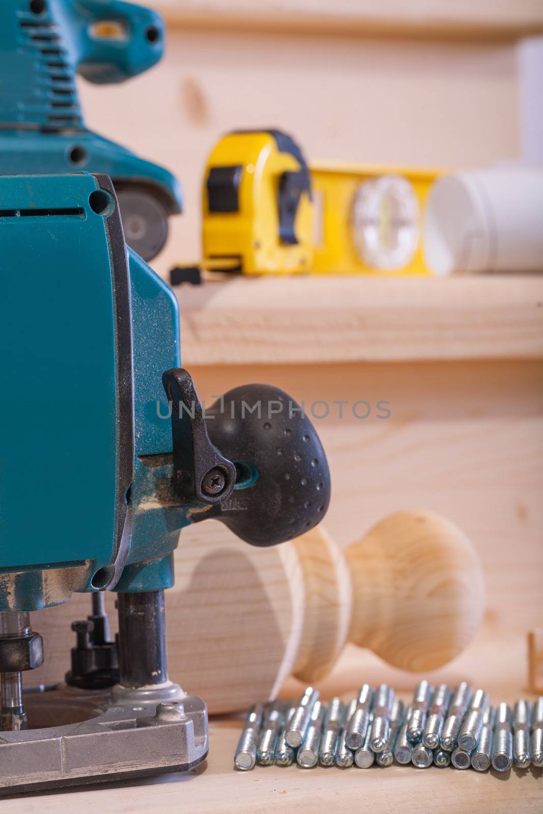 close up view on woodworking tools on wooden boards by mihalec