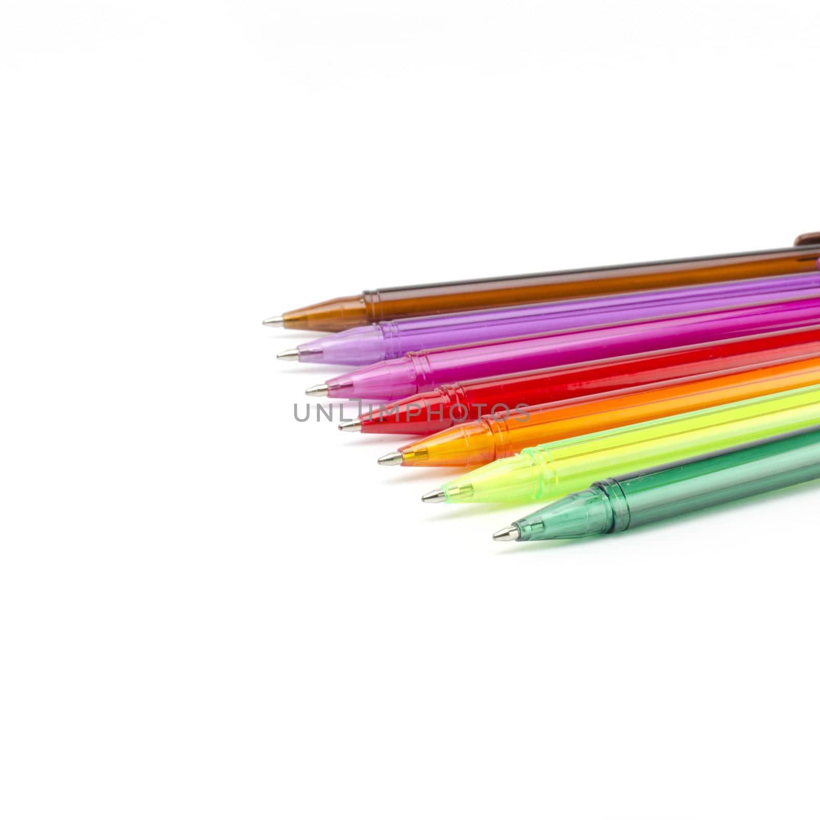 colorful pens isolated on white by ammza12