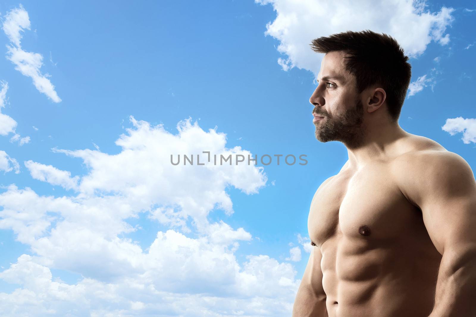 An image of a bright blue sky with a strong man