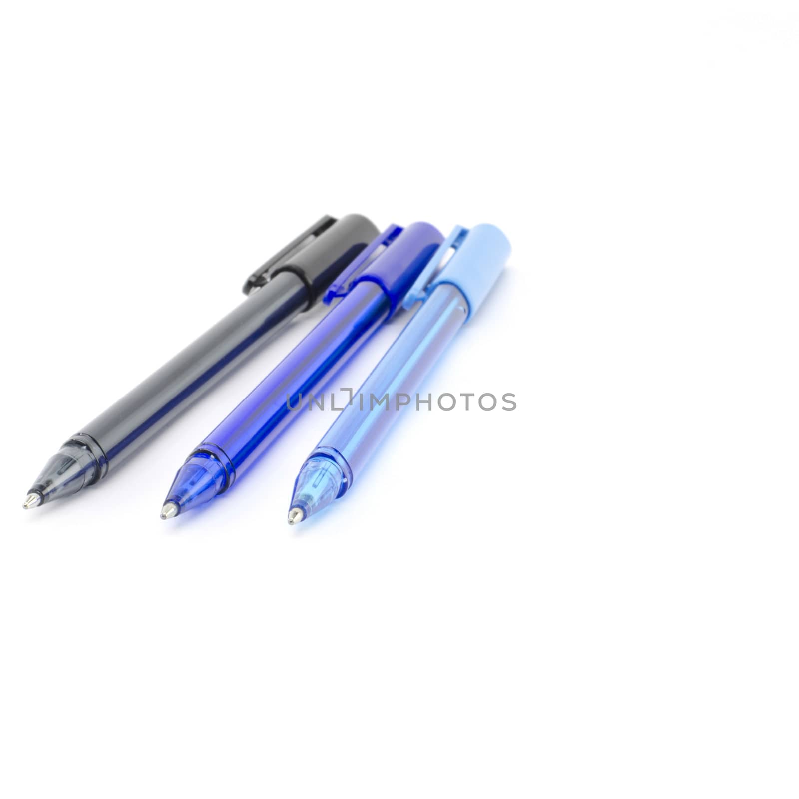 colorful pens isolated on white by ammza12