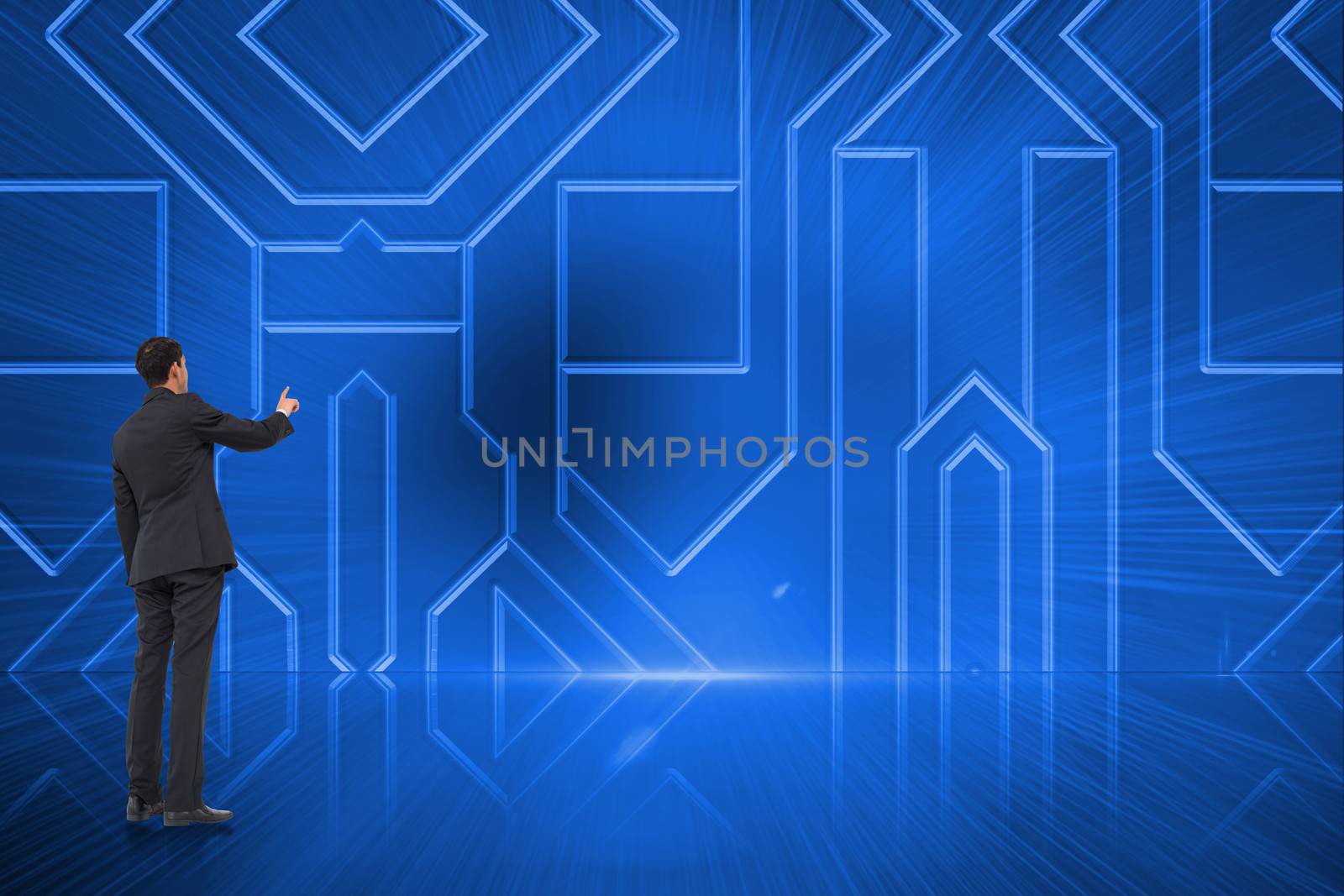 Asian businessman pointing against abstract technology background