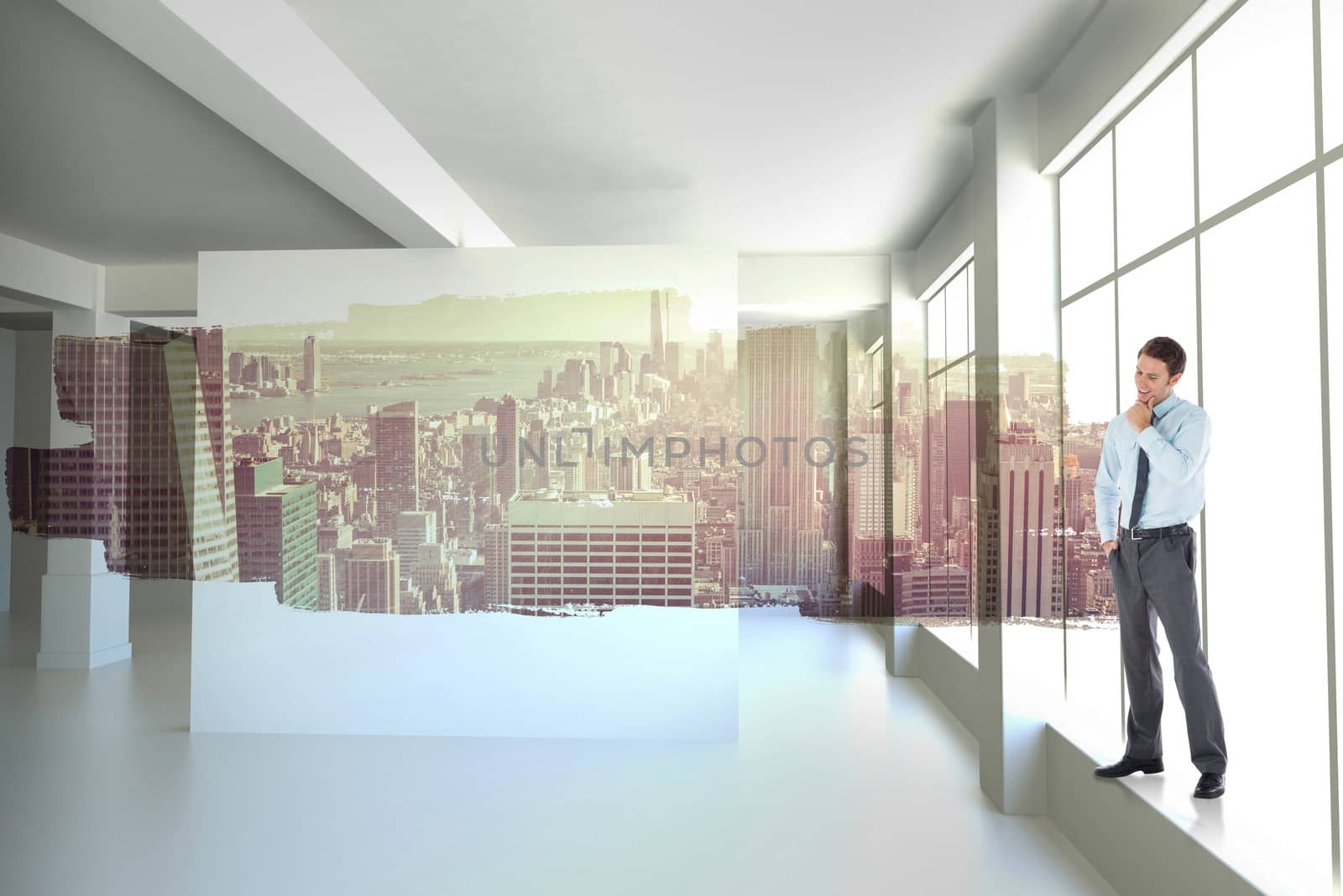 Thoughtful businessman with hand on chin against abstract screen in room showing cityscape