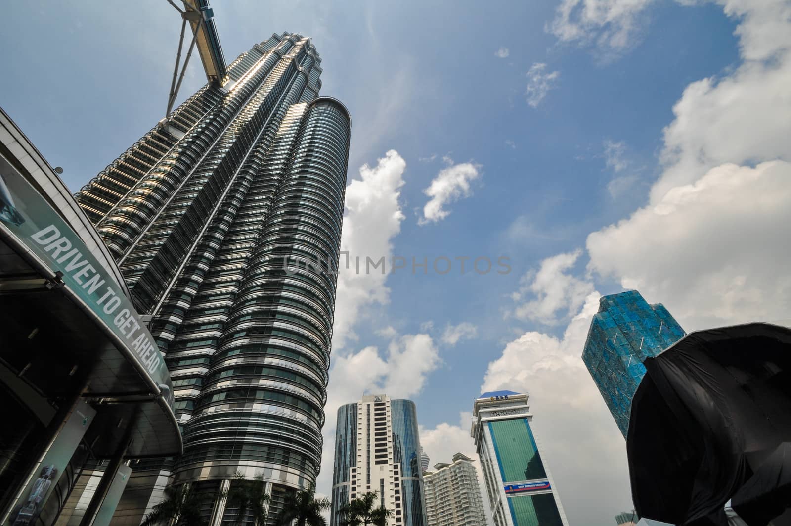 KUALA LUMPUR - APRIL 10: General view of Petronas Twin Towers on Apr 10, 2011 in Kuala Lumpur, Malaysia. The towers are the worlds tallest twin towers with the height of 451.9m.