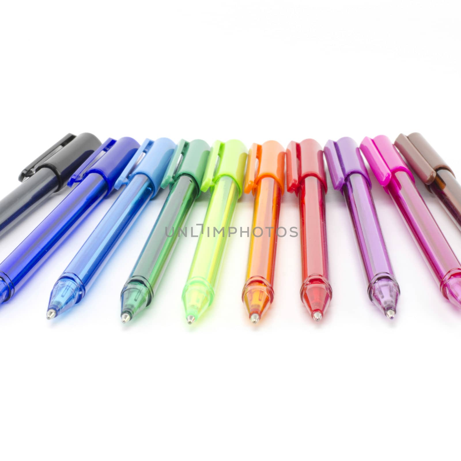 colorful pens isolated on white by ammza12