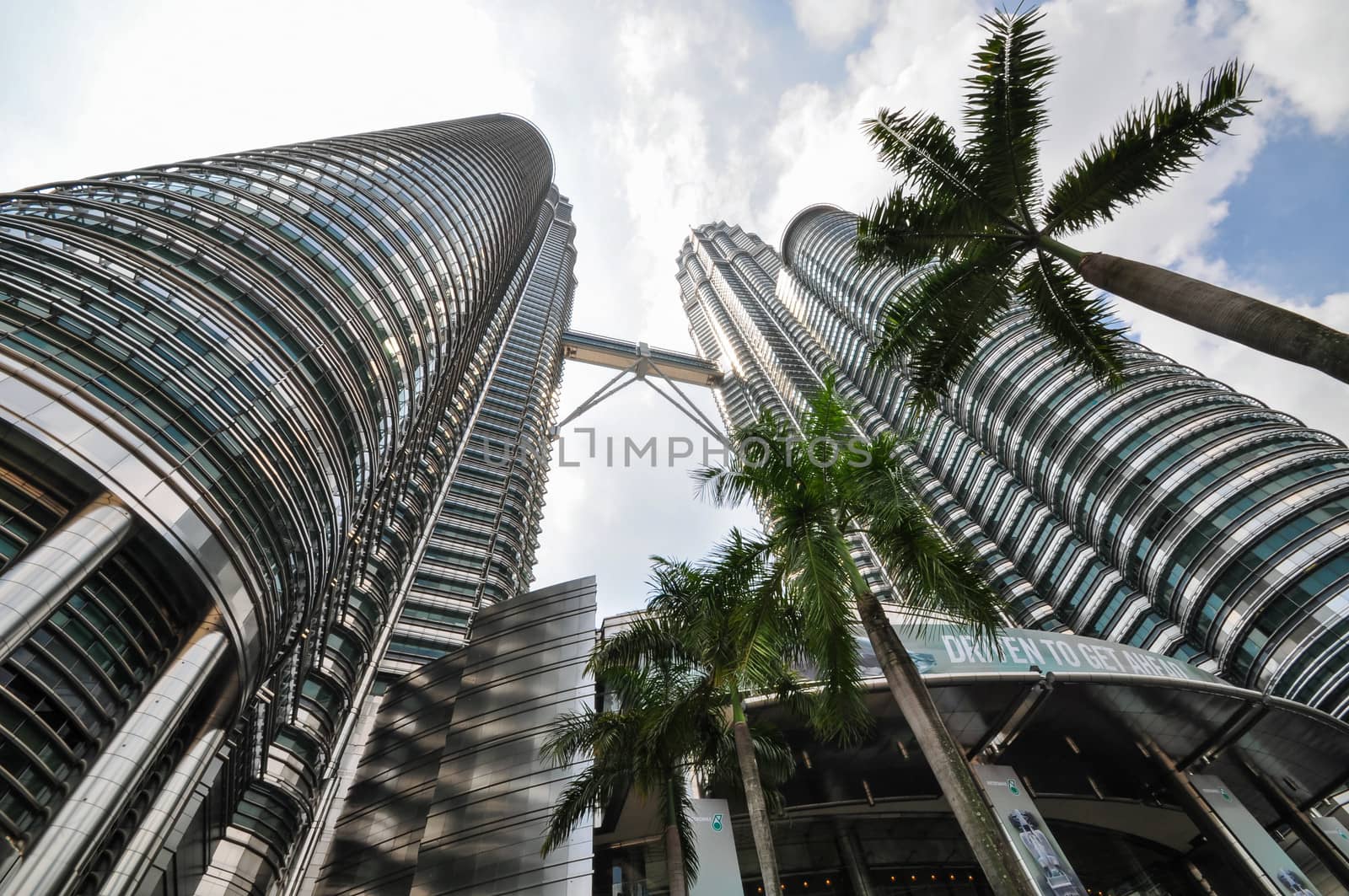 KUALA LUMPUR - APRIL 10: General view of Petronas Twin Towers on Apr 10, 2011 in Kuala Lumpur, Malaysia. The towers are the worlds tallest twin towers with the height of 451.9m.