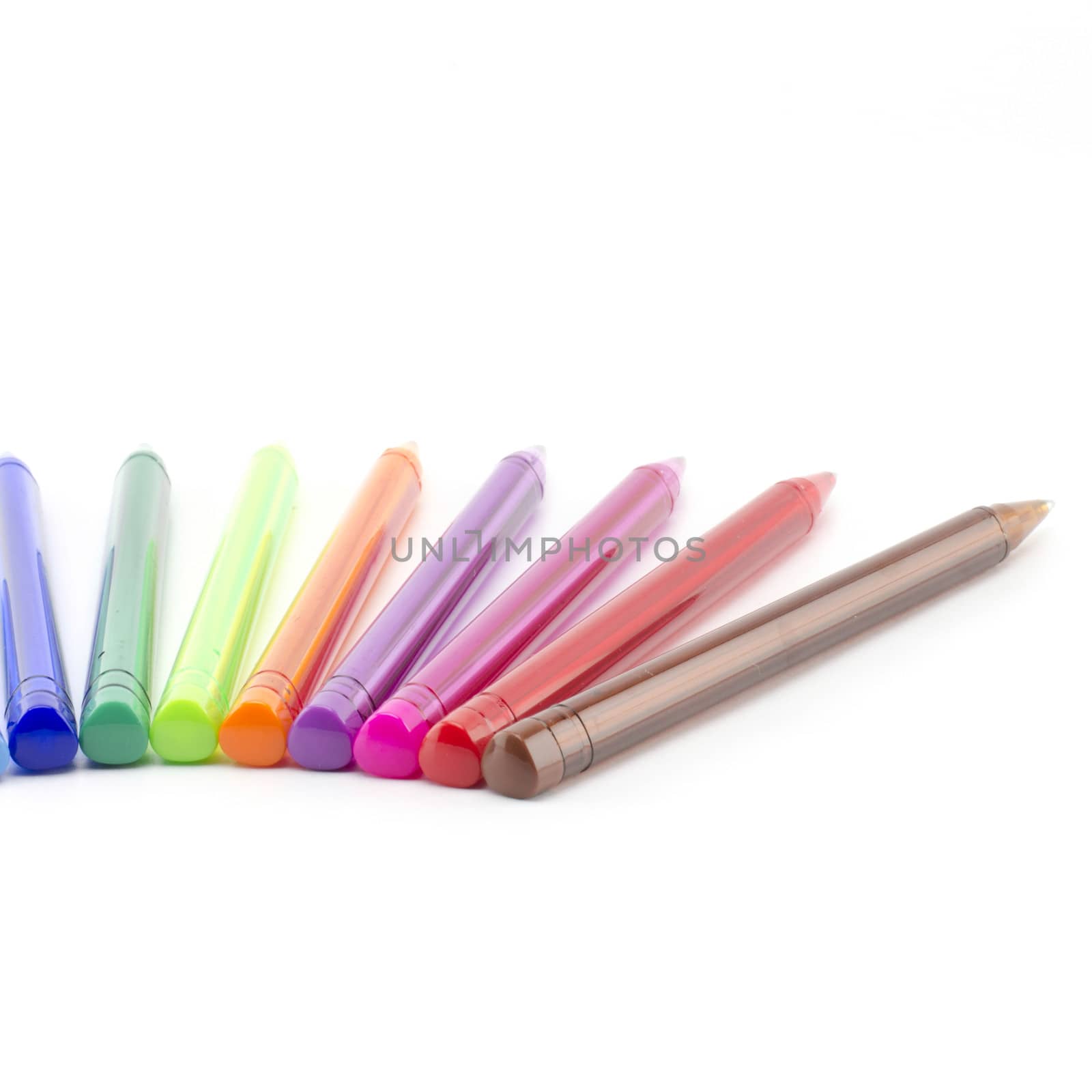 colorful pens isolated on white by ammza12