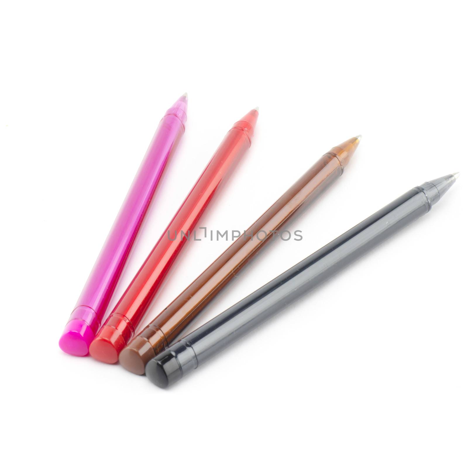 colorful pens isolated on white by ammza12