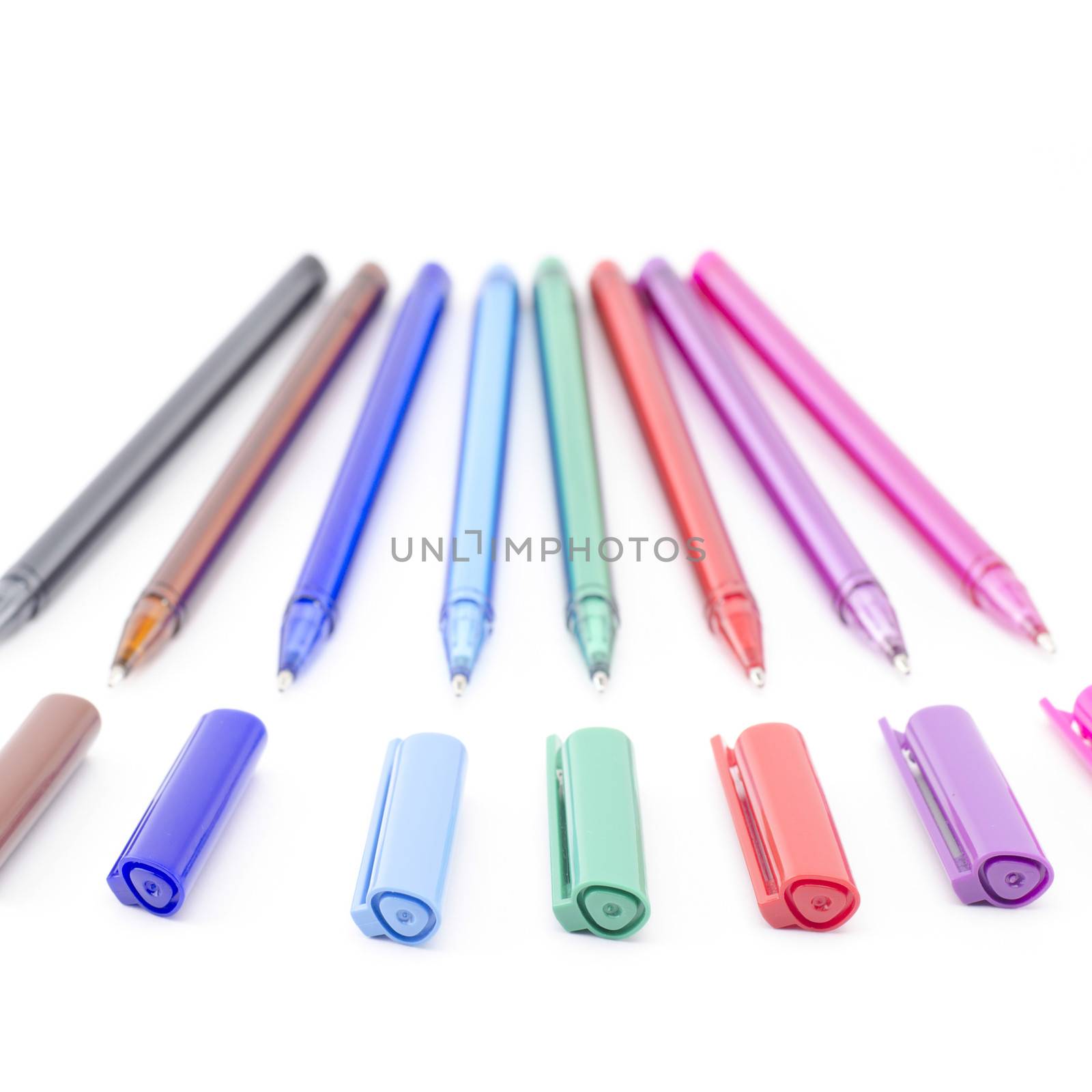 colorful pens isolated on white by ammza12