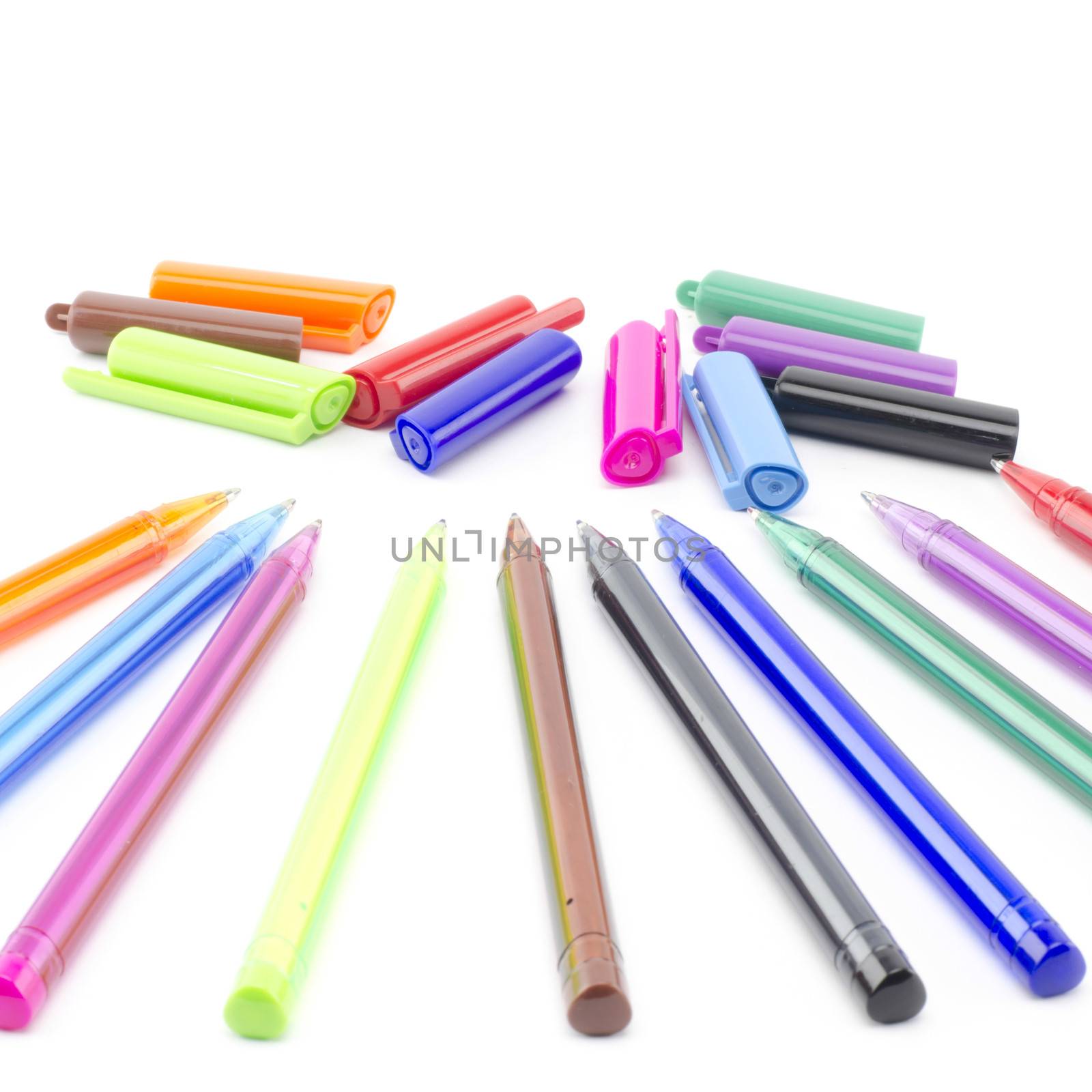 colorful pens isolated on white by ammza12