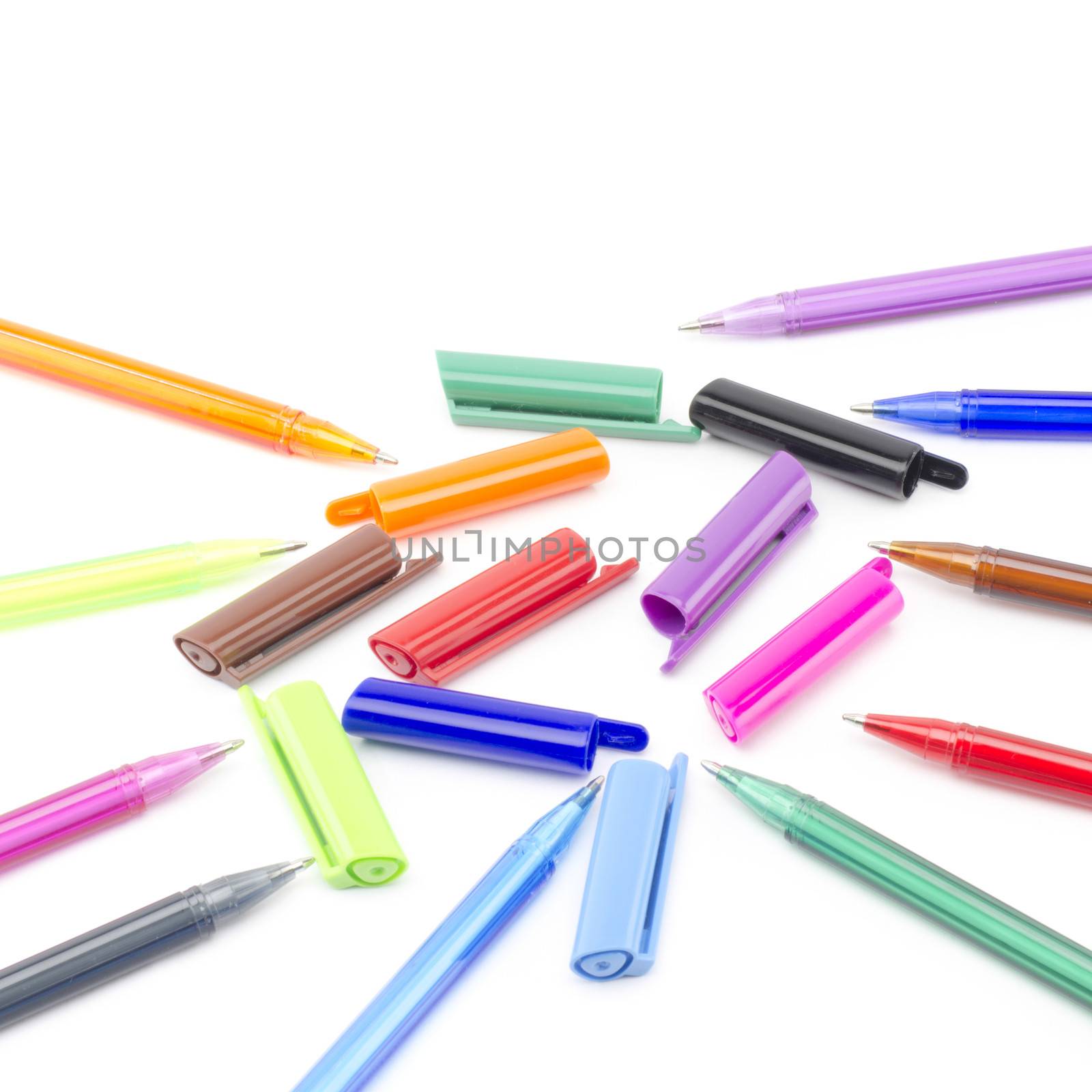 colorful pens isolated on white by ammza12