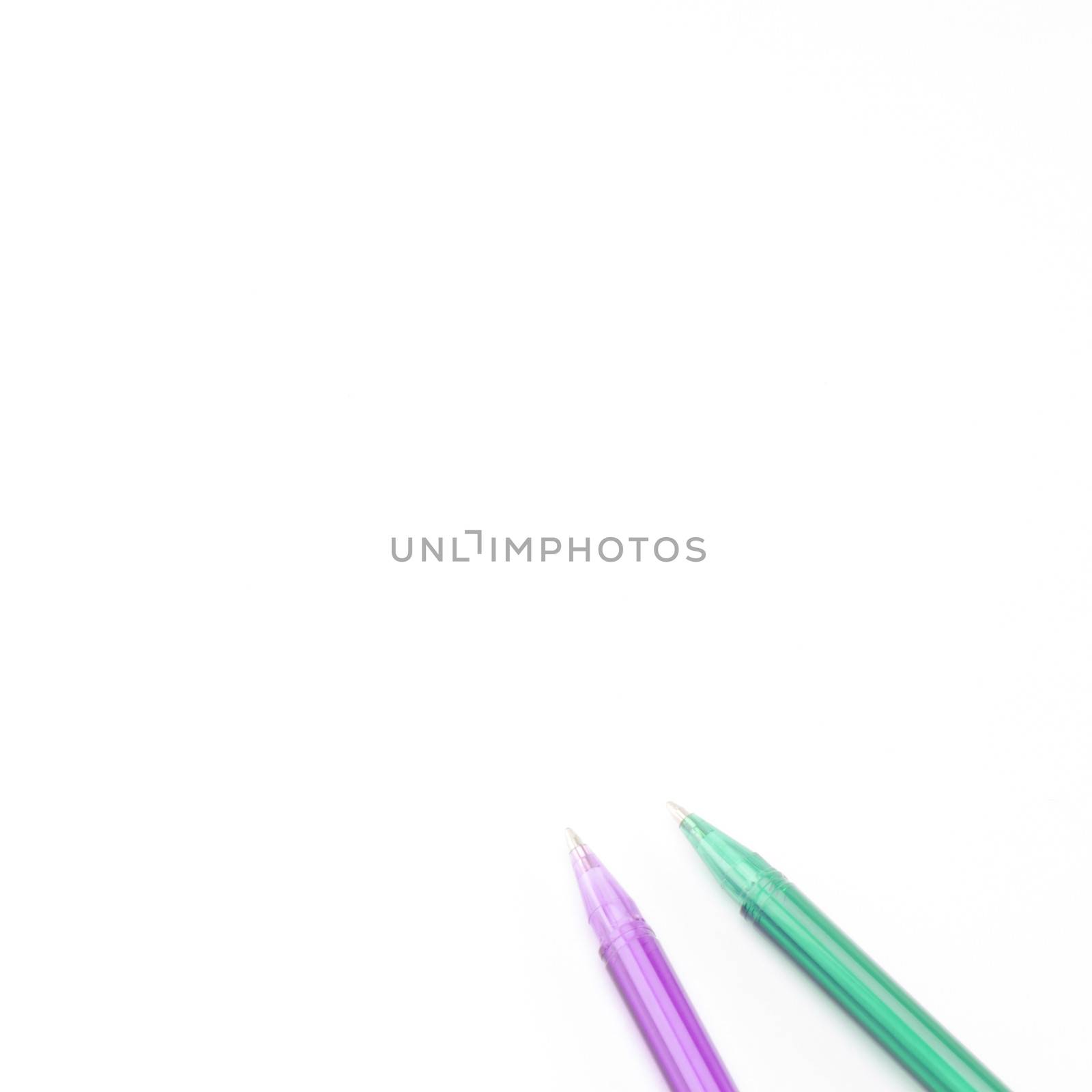 colorful pens isolated on white by ammza12