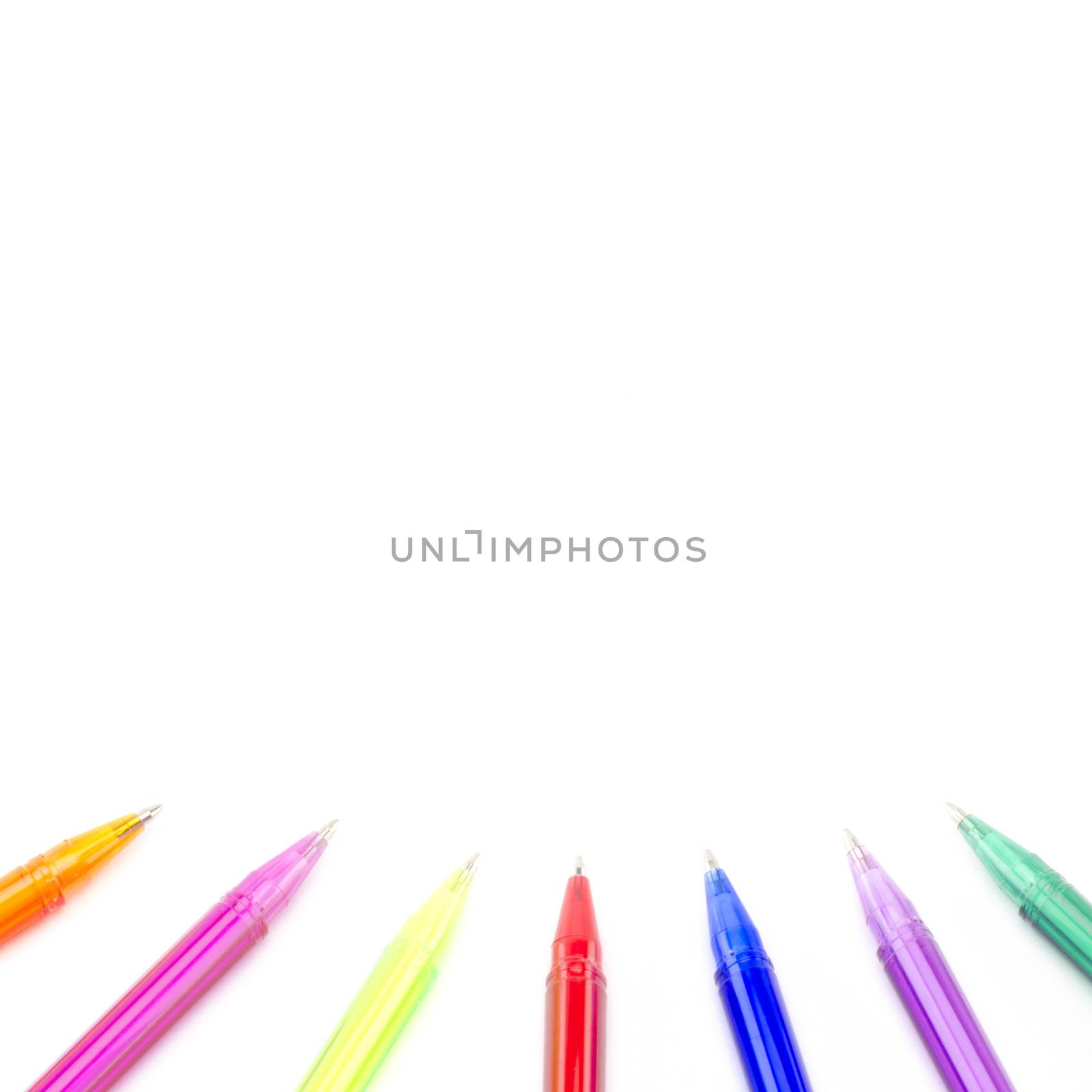 colorful pens isolated on white by ammza12