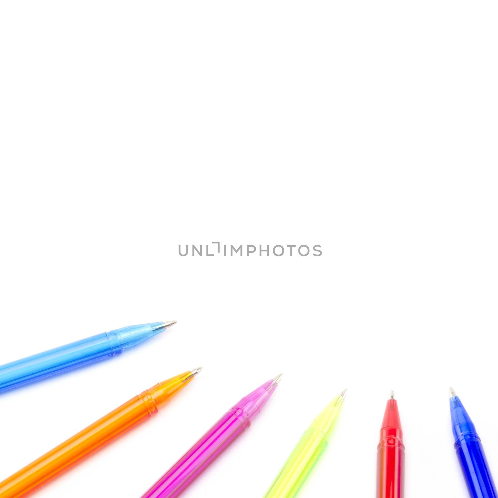 colorful pens isolated on white by ammza12