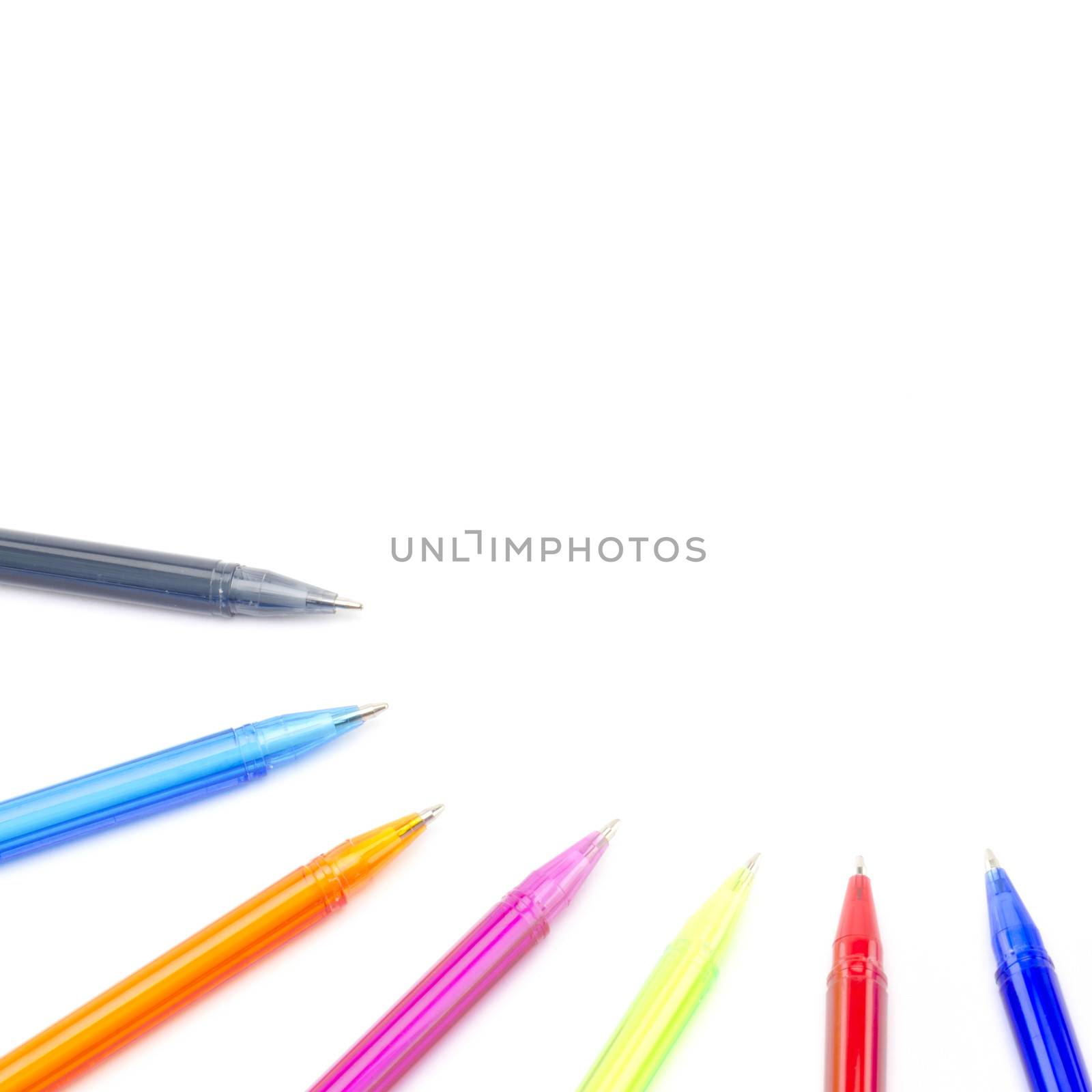 colorful pens isolated on white by ammza12